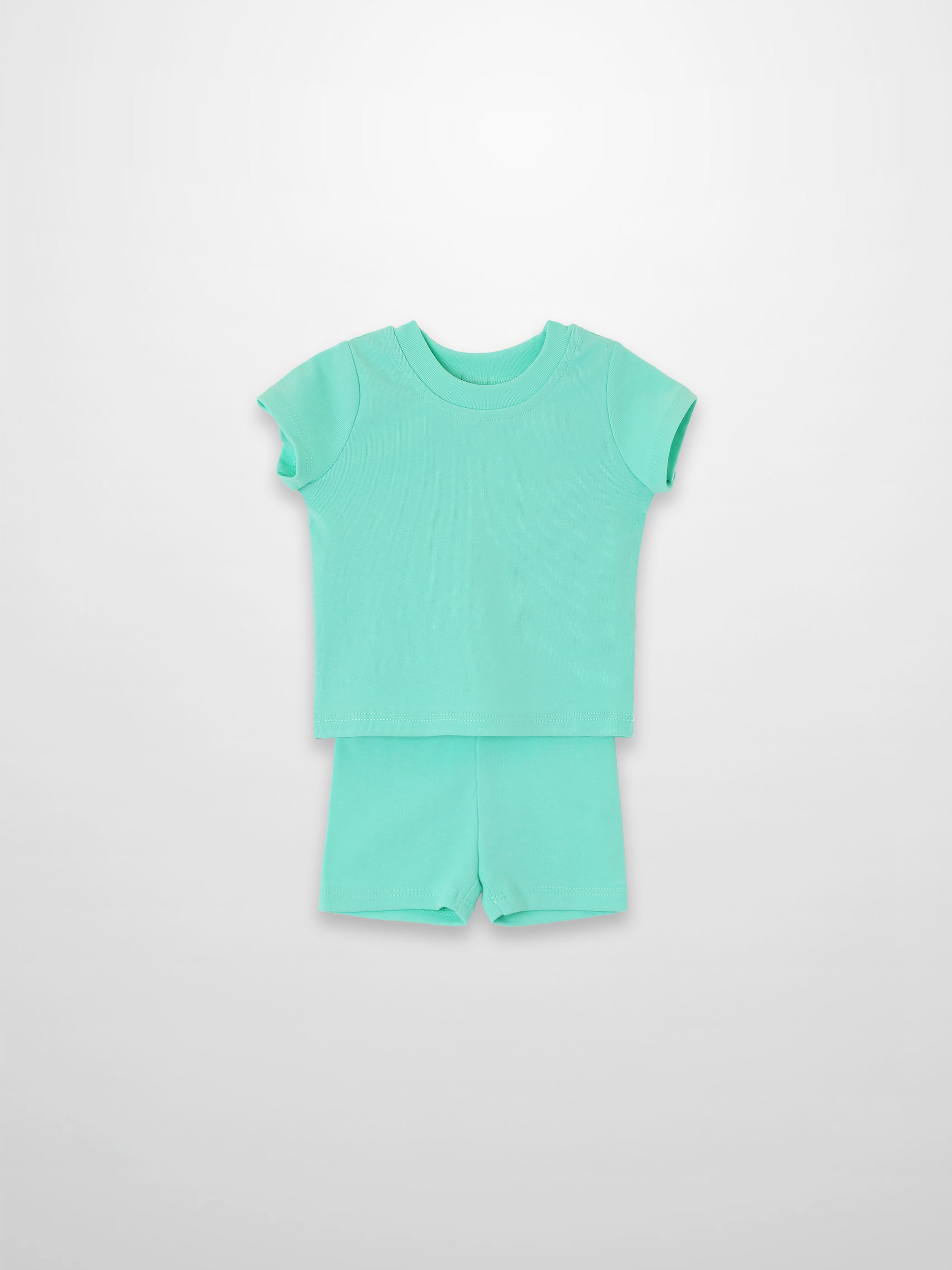 Mint green short-sleeve boxy T-shirt and matching shorts set.