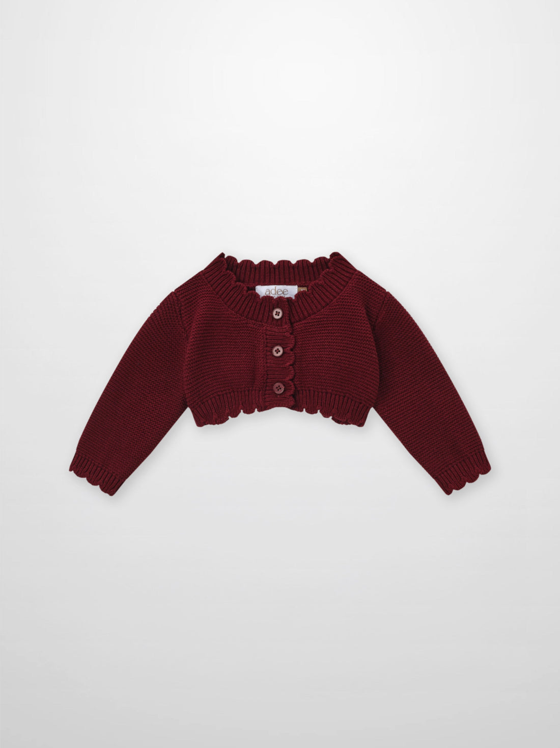 Adee cropped burgundy cardigan, unisex dressy knit with ribbed collar and button placket.