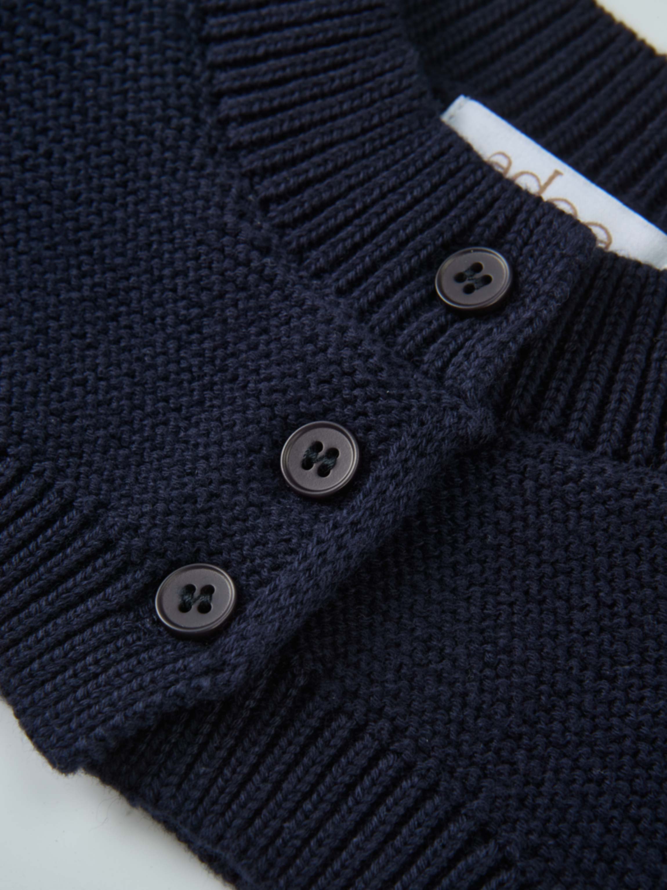 Adee Cropped Cardigan navy knit with button-front closure; unisex dressy top