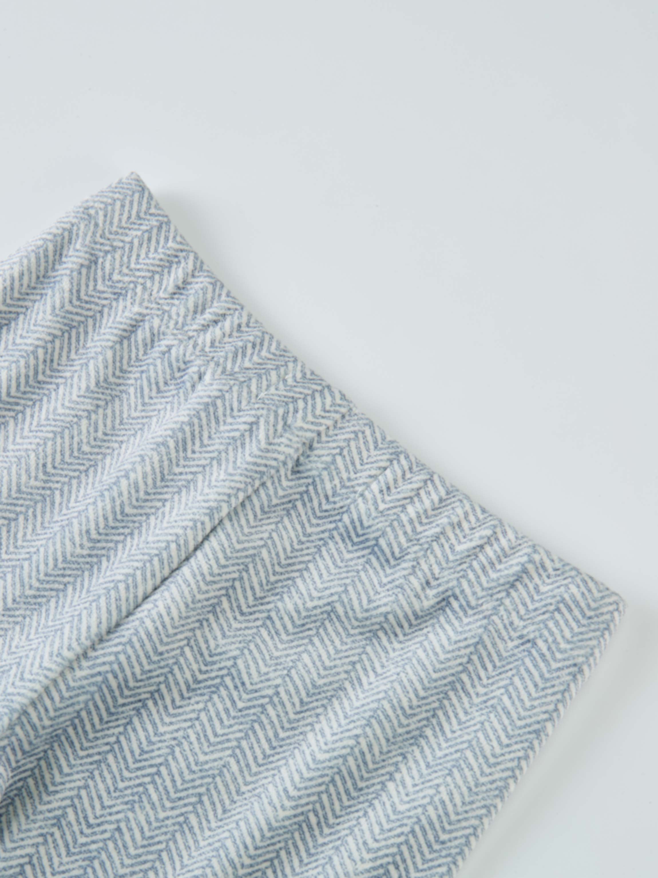 Herringbone Pajamas for boys, blue patterned fabric, folded