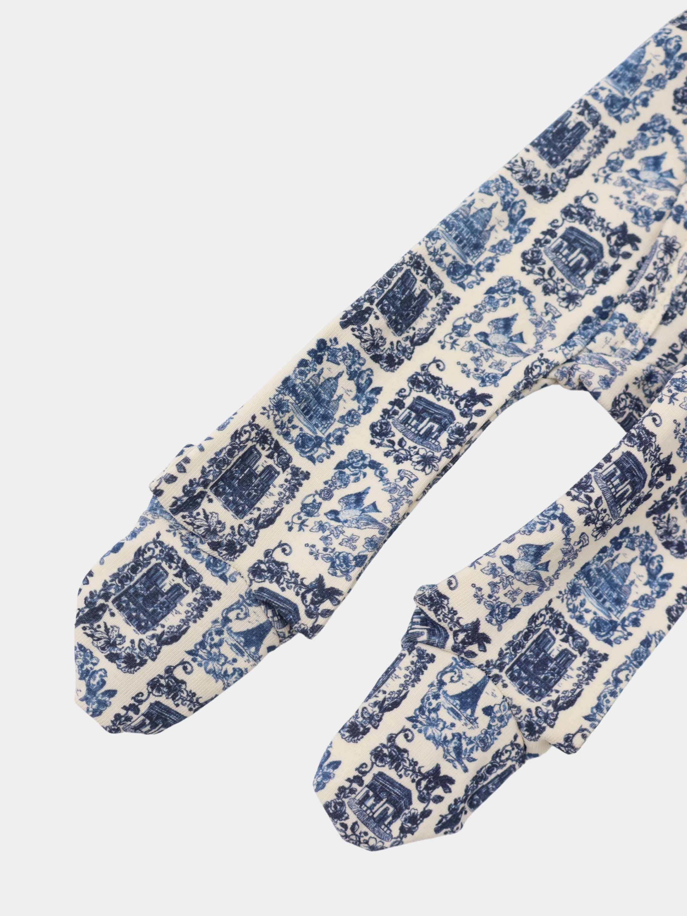 Blue Landmark layette set for boys by Adee with blue toile print on cream fabric.