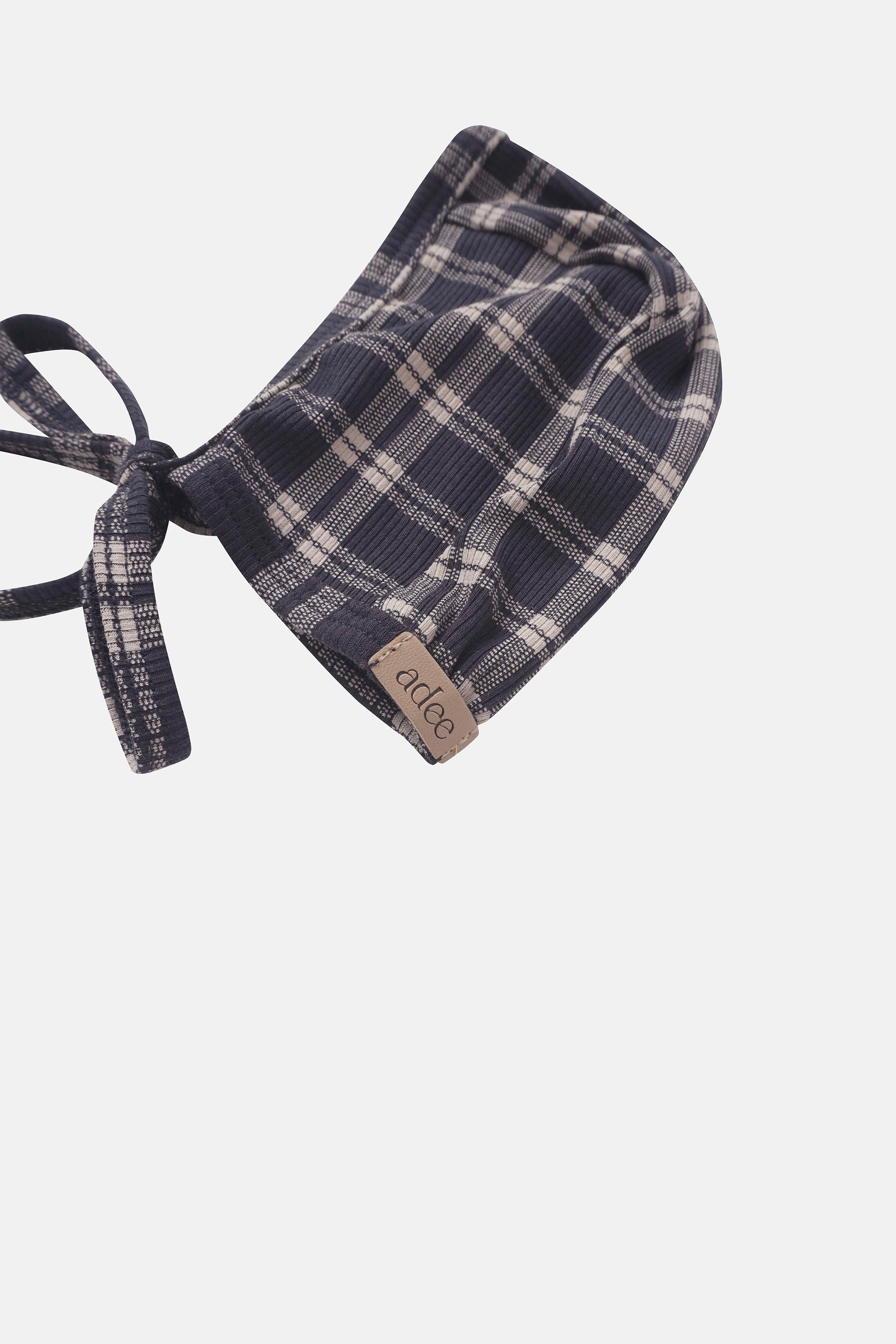 Navy plaid bonnet for boys by Adee with tied straps