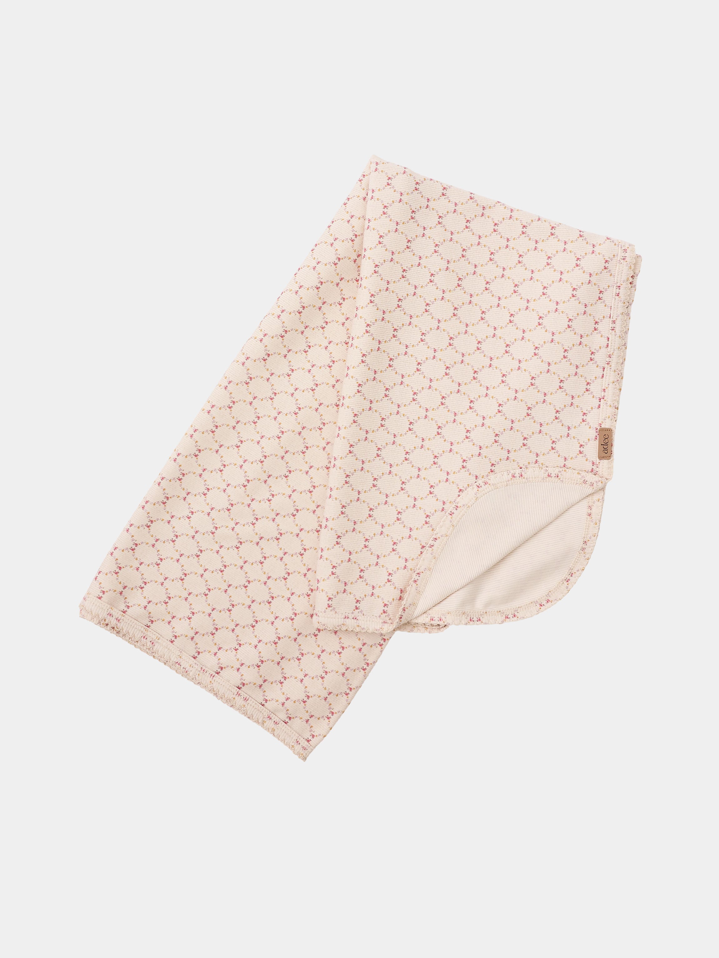 Floral Garland Layette Set blanket by Adee in pale pink with a small floral lattice pattern