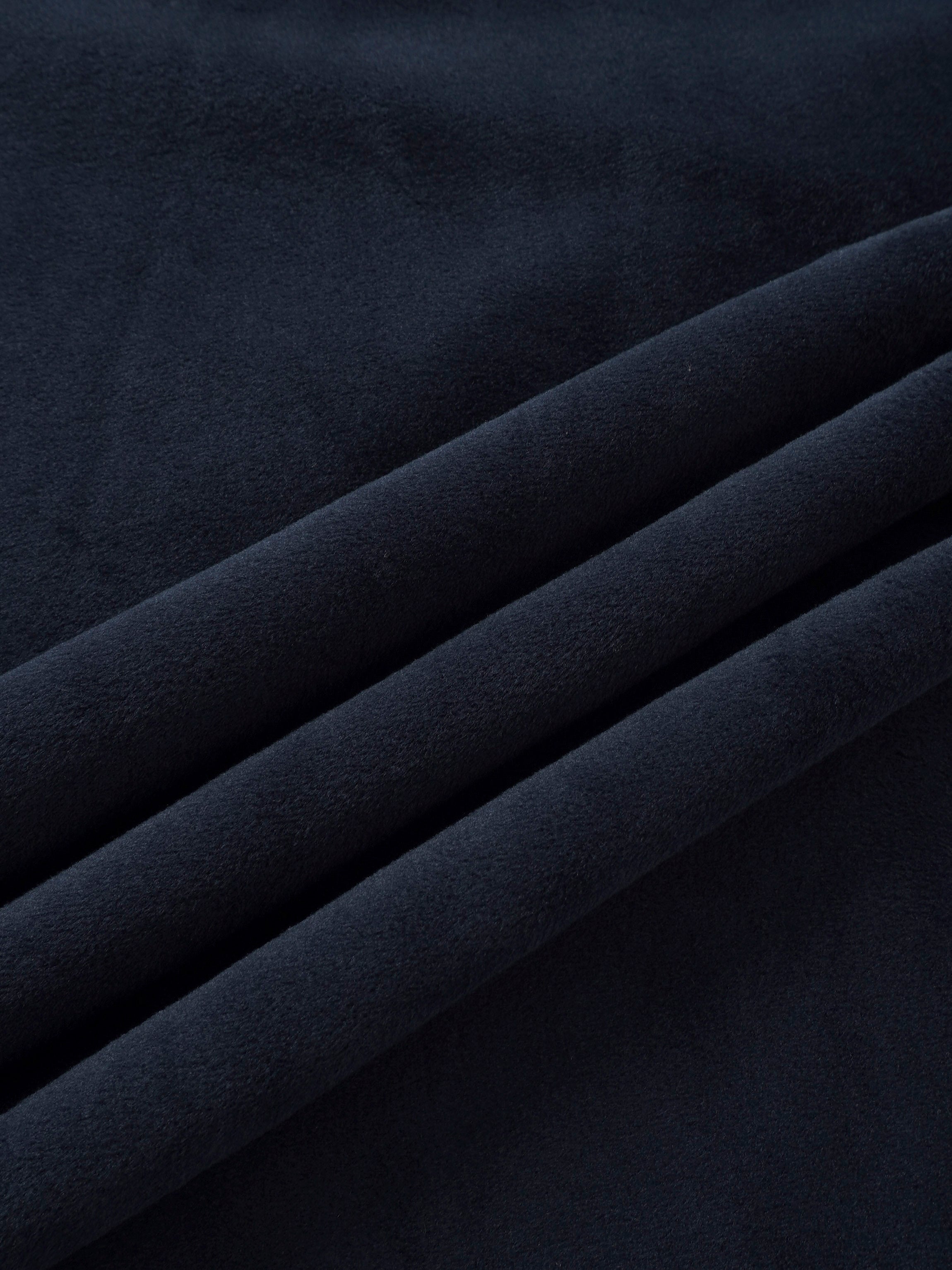Embroidered Bear Navy layette set; Adee brand, navy blue plush fabric close-up