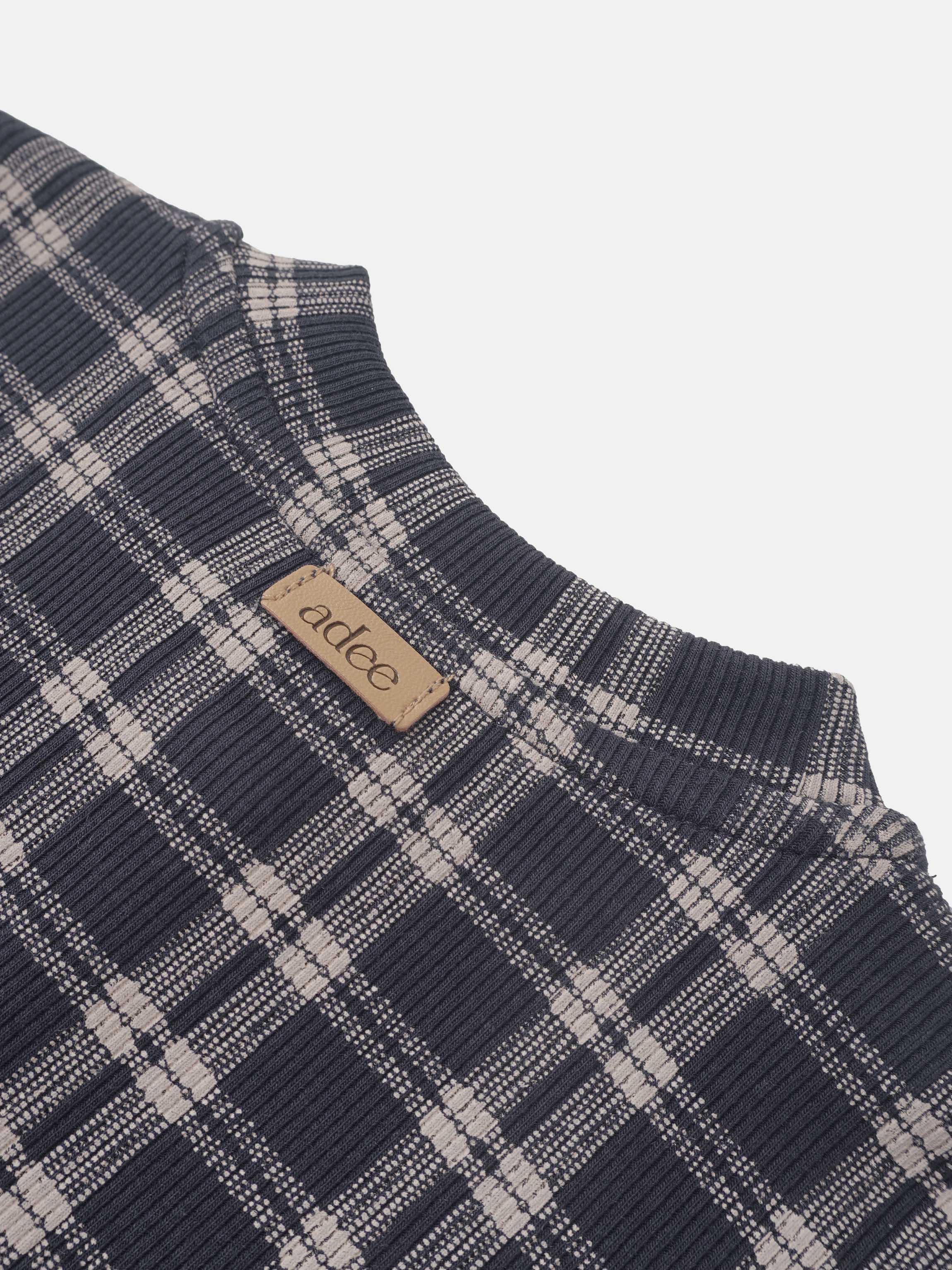 Adee boys plaid pajamas top in blue, close-up of ribbed knit fabric and brand tag