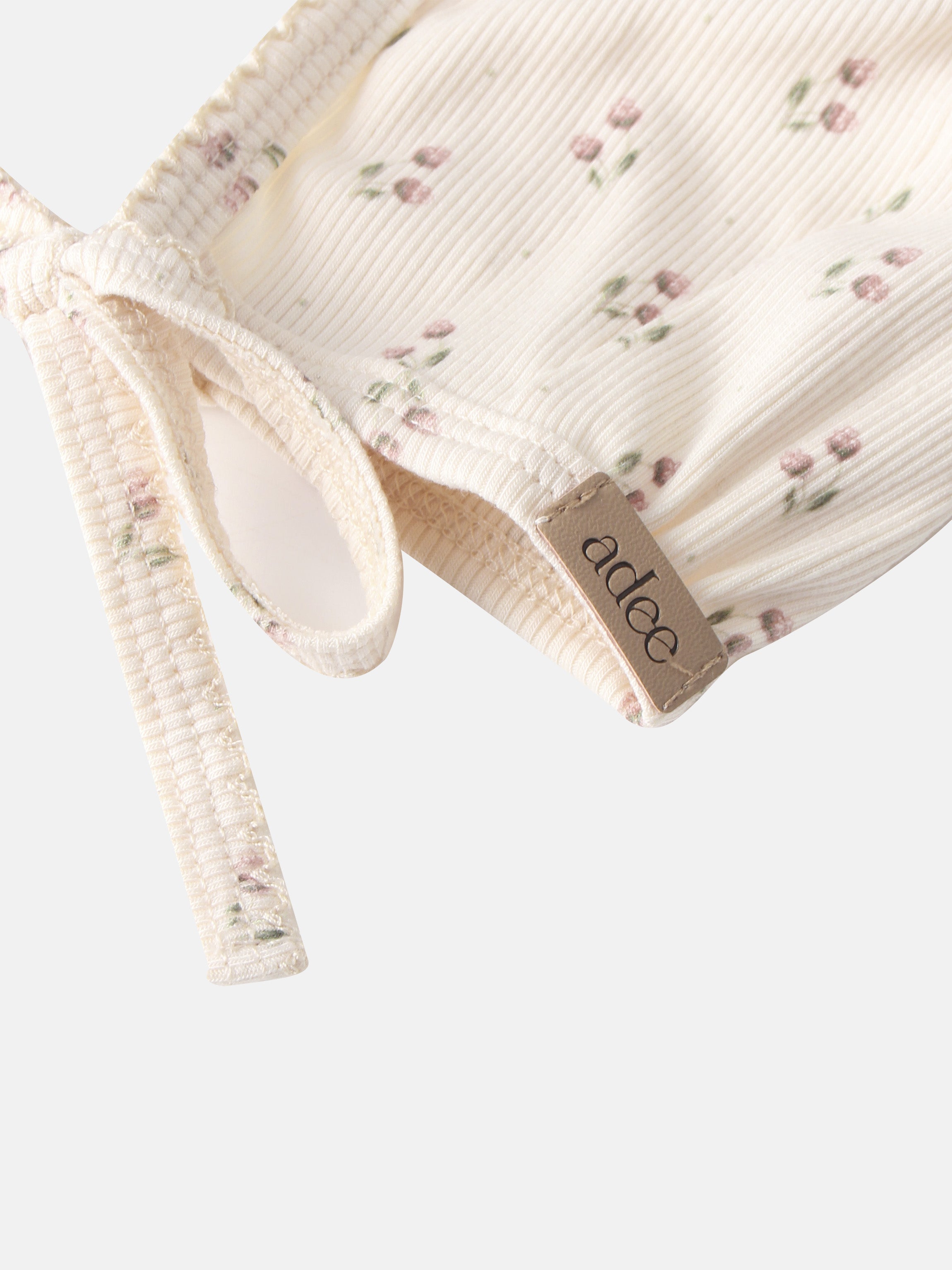 Tiny Tulip Layette Set by Adee; cream ribbed fabric with pink floral print