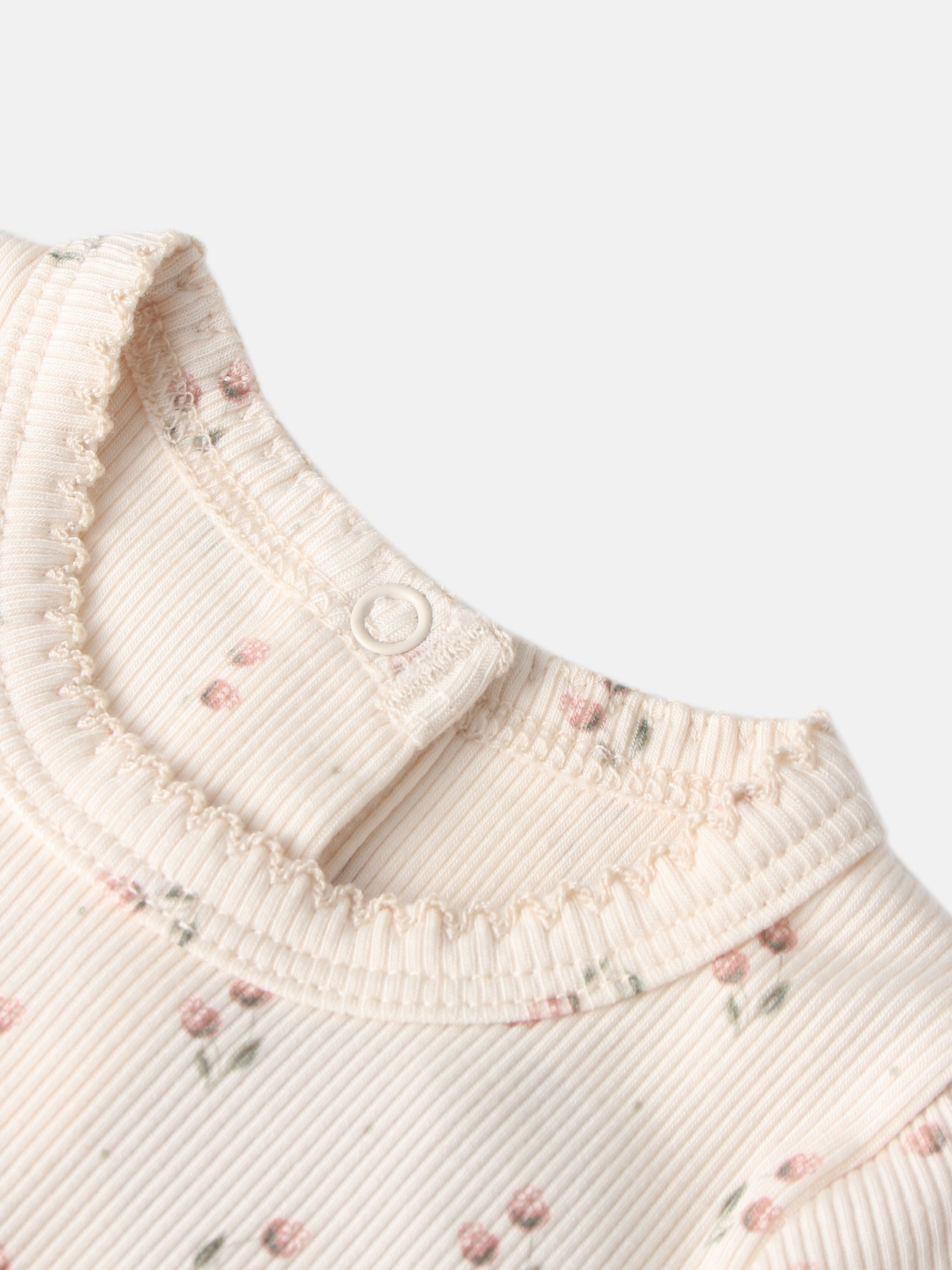 Adee Tiny Tulip Layette Set; cream ribbed knit with tiny pink floral prints and ruffled trim