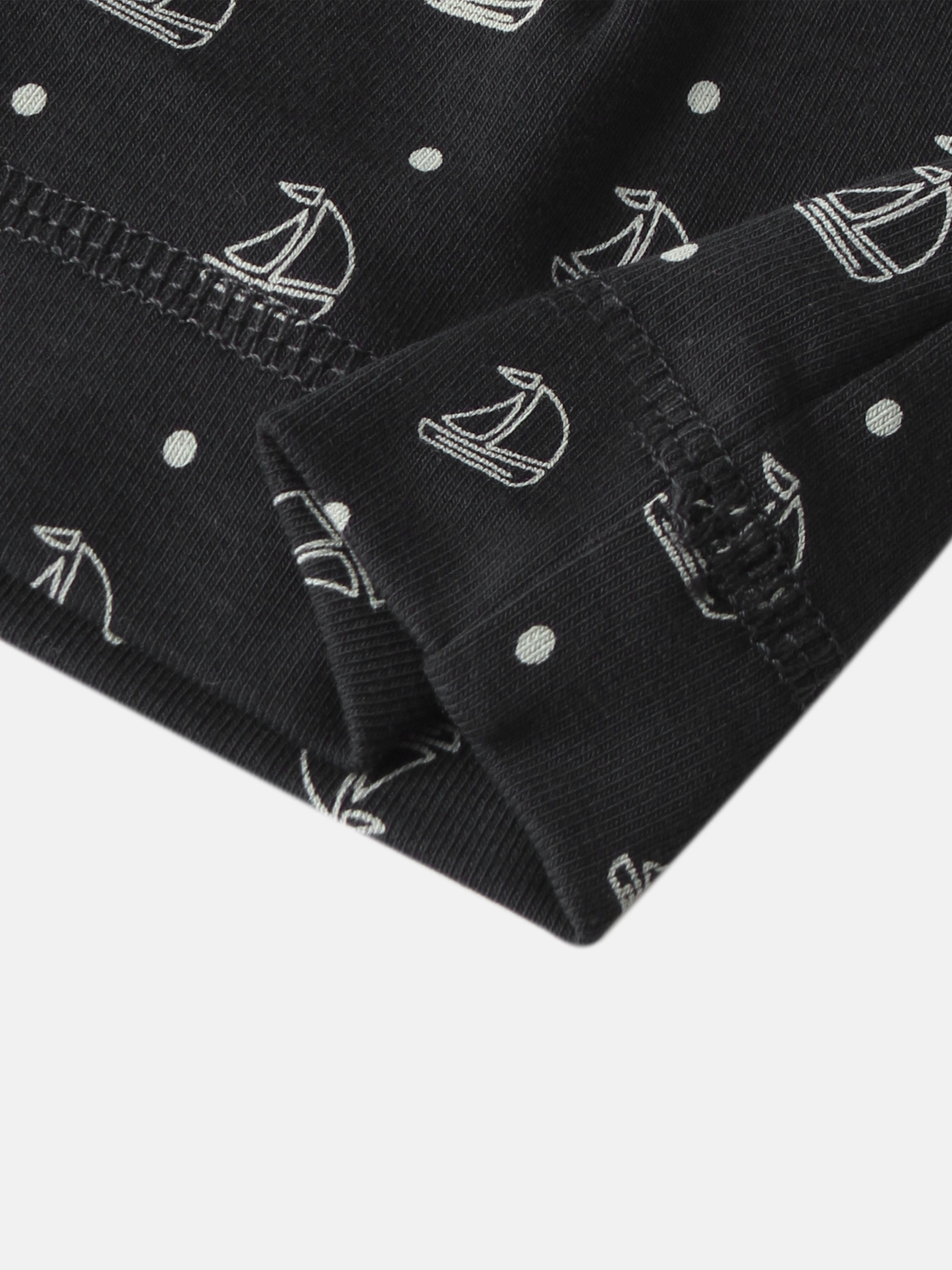 Harbor Dot Layette Set for boys; navy fabric with white anchor motifs and dots