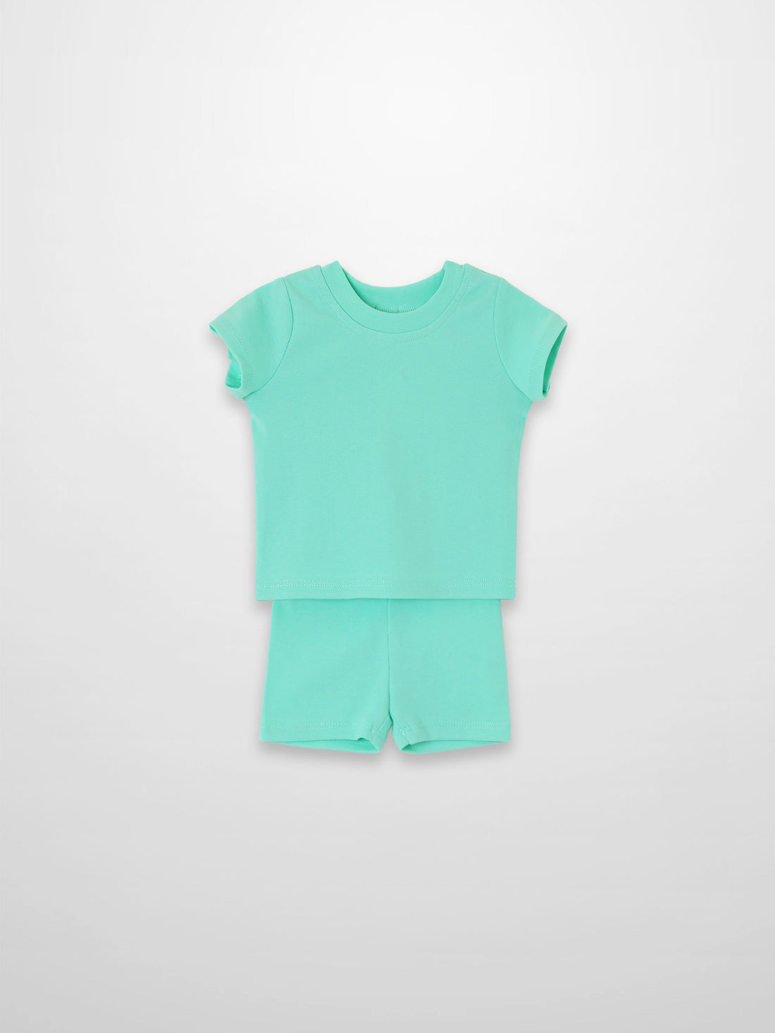 Mint green short-sleeve boxy T-shirt and matching shorts set.