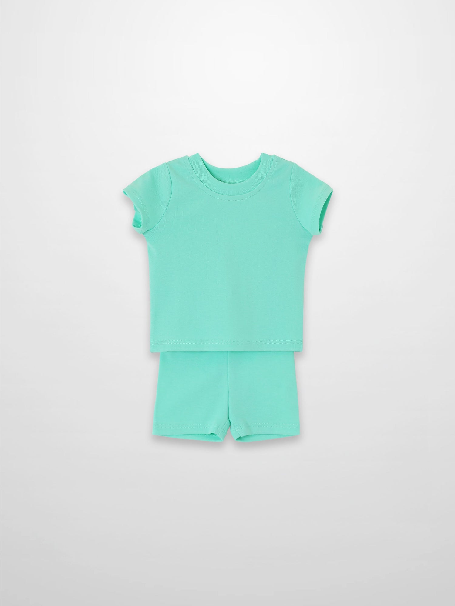 Mint green short-sleeve boxy T-shirt and matching shorts set.