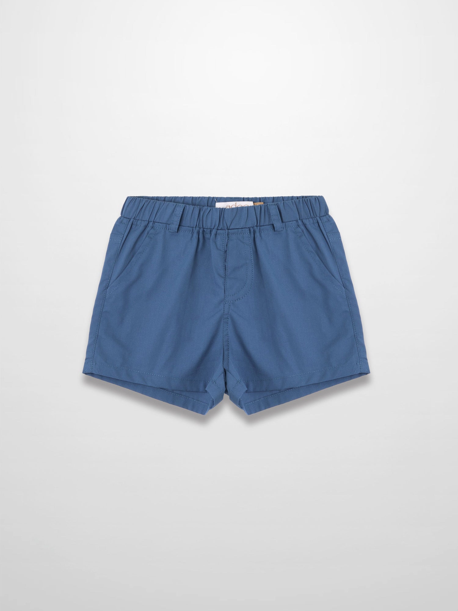 Blue cotton shorts with elastic waistband, laid flat.