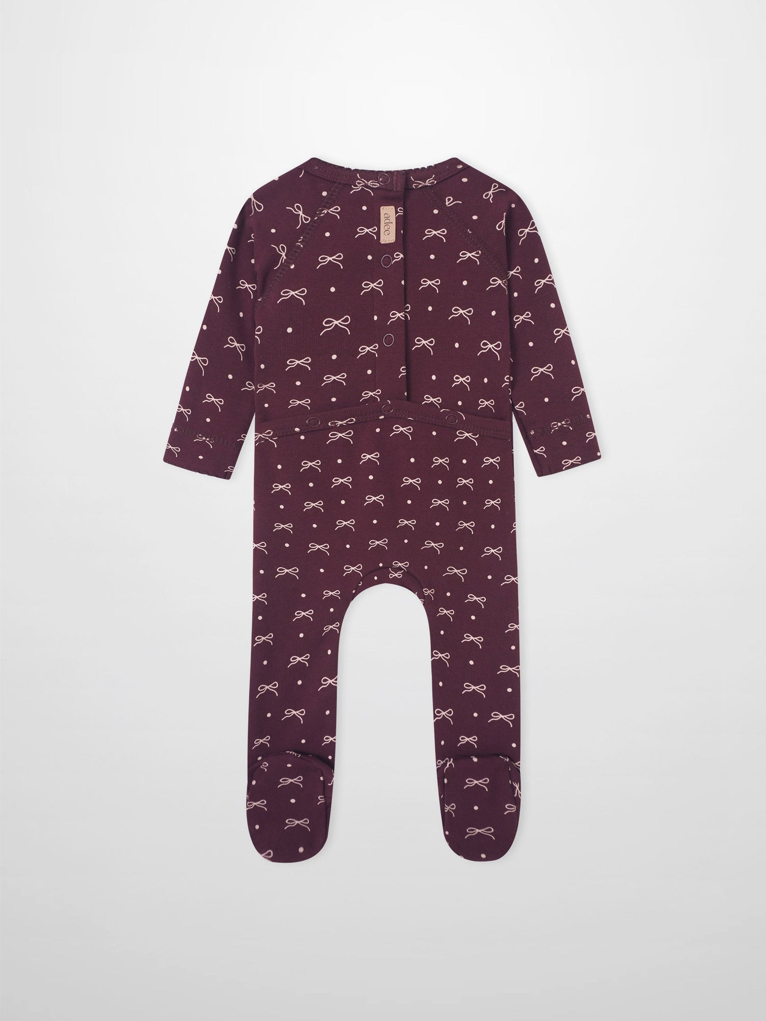 Girls Stretchies by Adee in burgundy with white bow prints and dot pattern