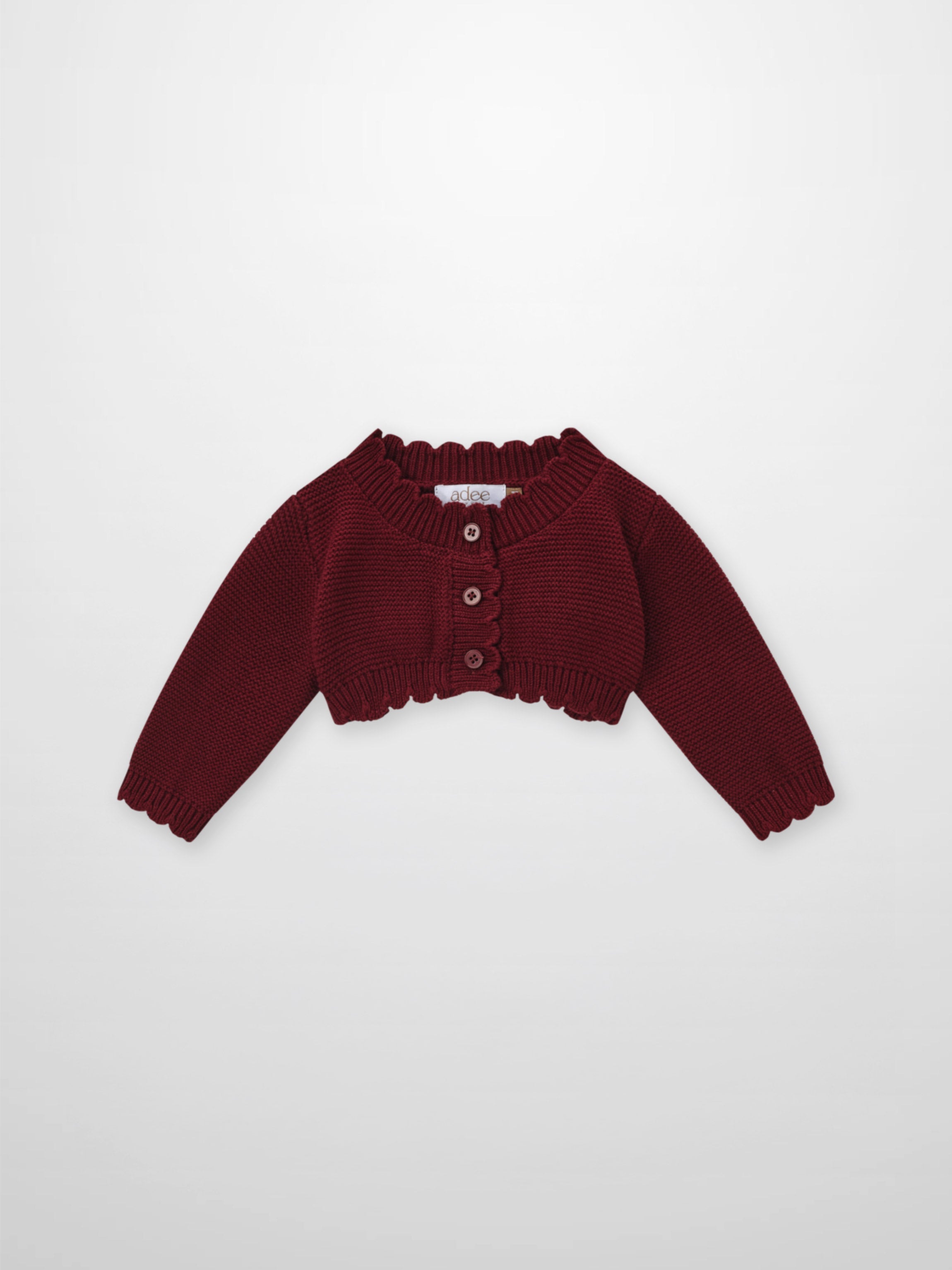 Adee cropped burgundy cardigan, unisex dressy knit with ribbed collar and button placket.