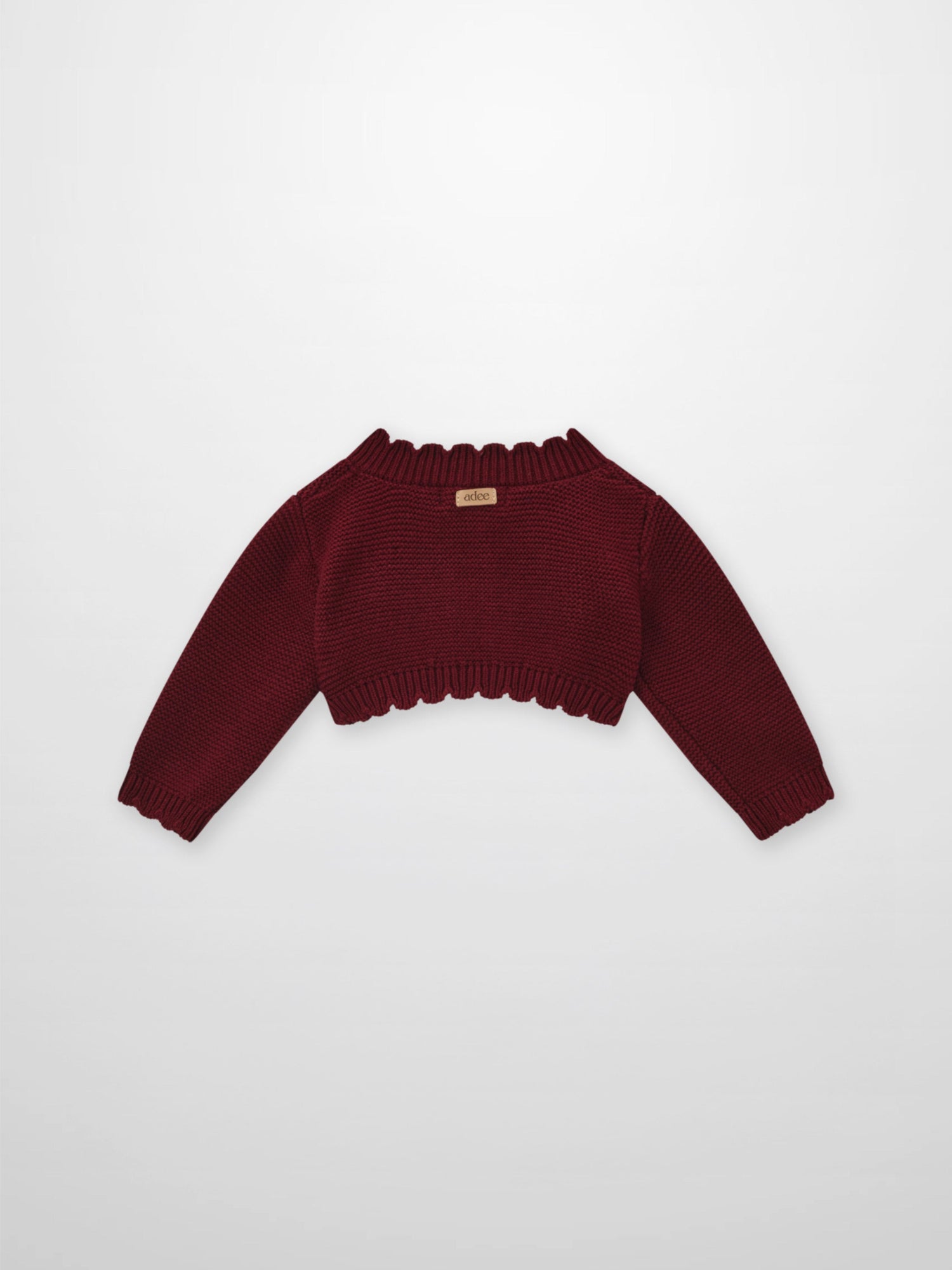Cropped cardigan burgundy by Adee; unisex dressy knit top with ribbed cuffs and hem.