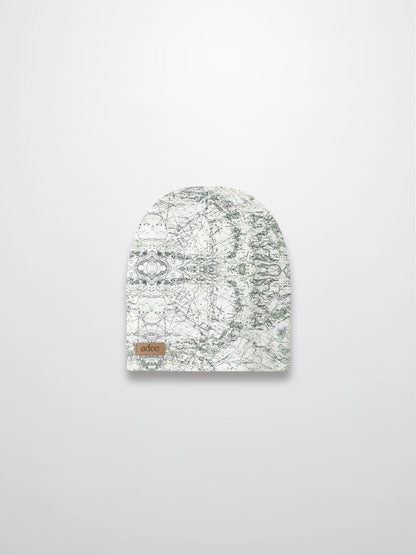 Map Beanie: off-white baby beanie with sketched map print, grey lines, compass markers and decorative stitching.