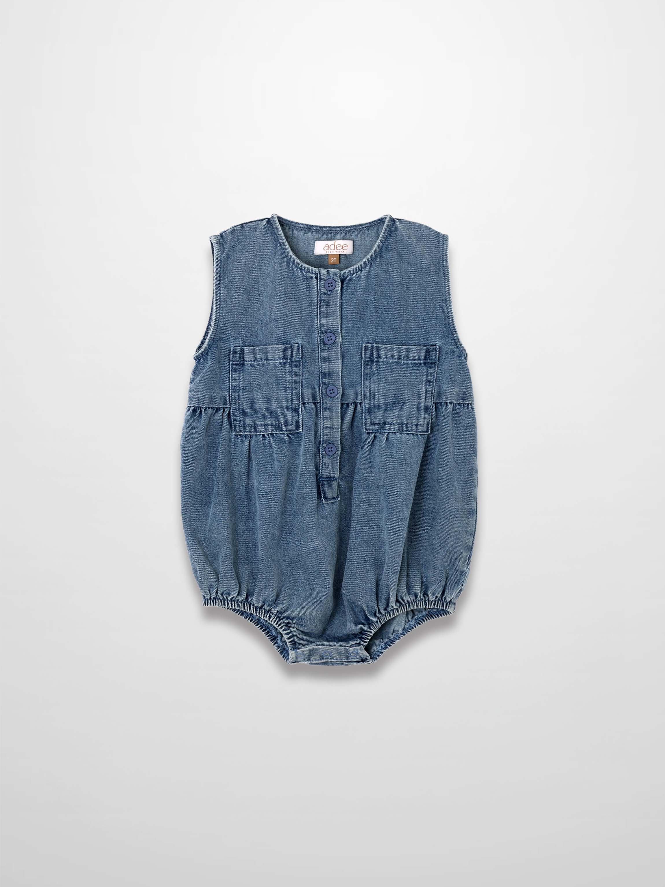 Blue denim romper with button placket, two chest pockets, and elastic leg openings.