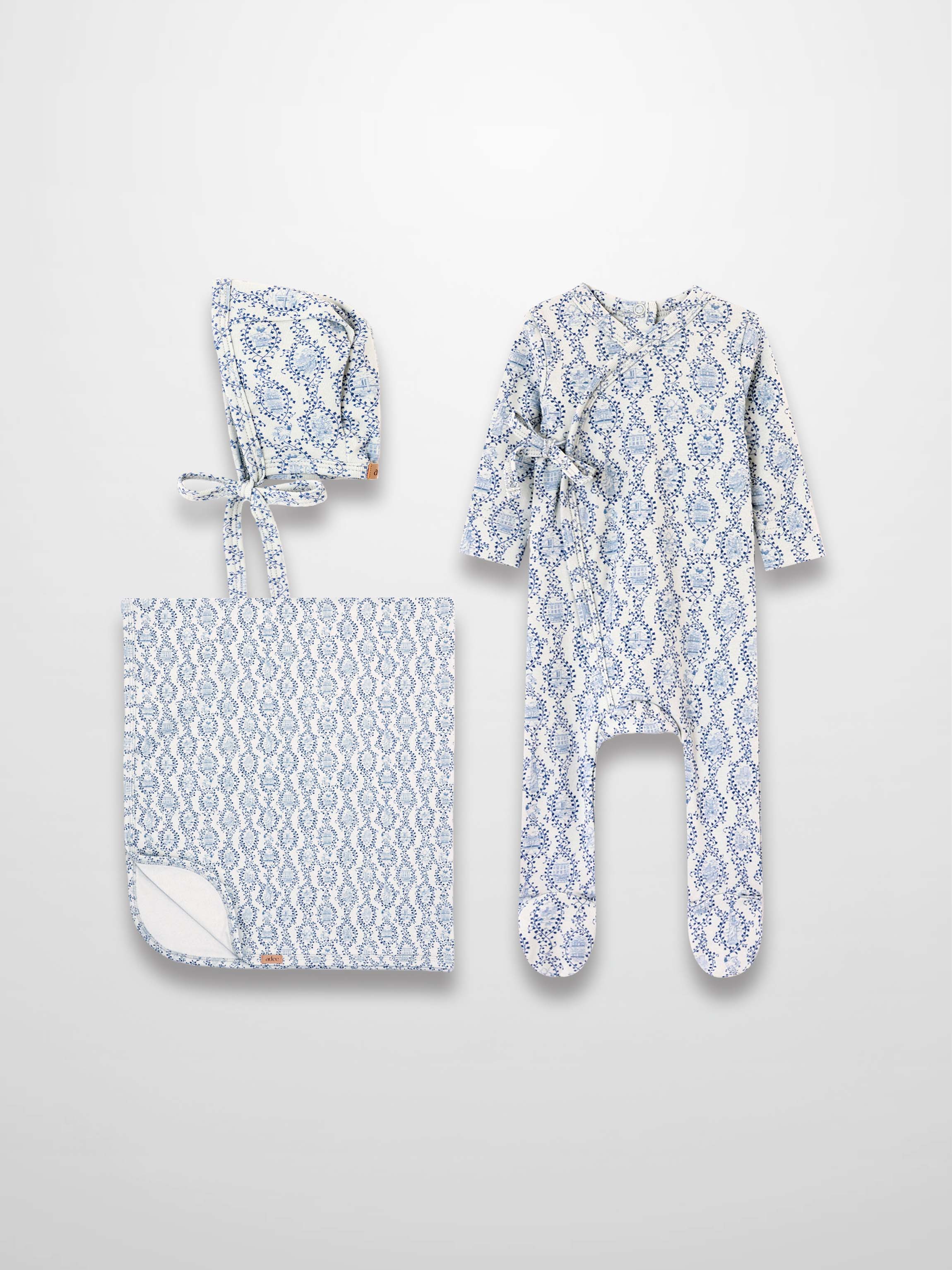 Blue Charm Layette Set by Adee; 3-piece boys set in light blue pattern (hat, blanket, and footed romper)