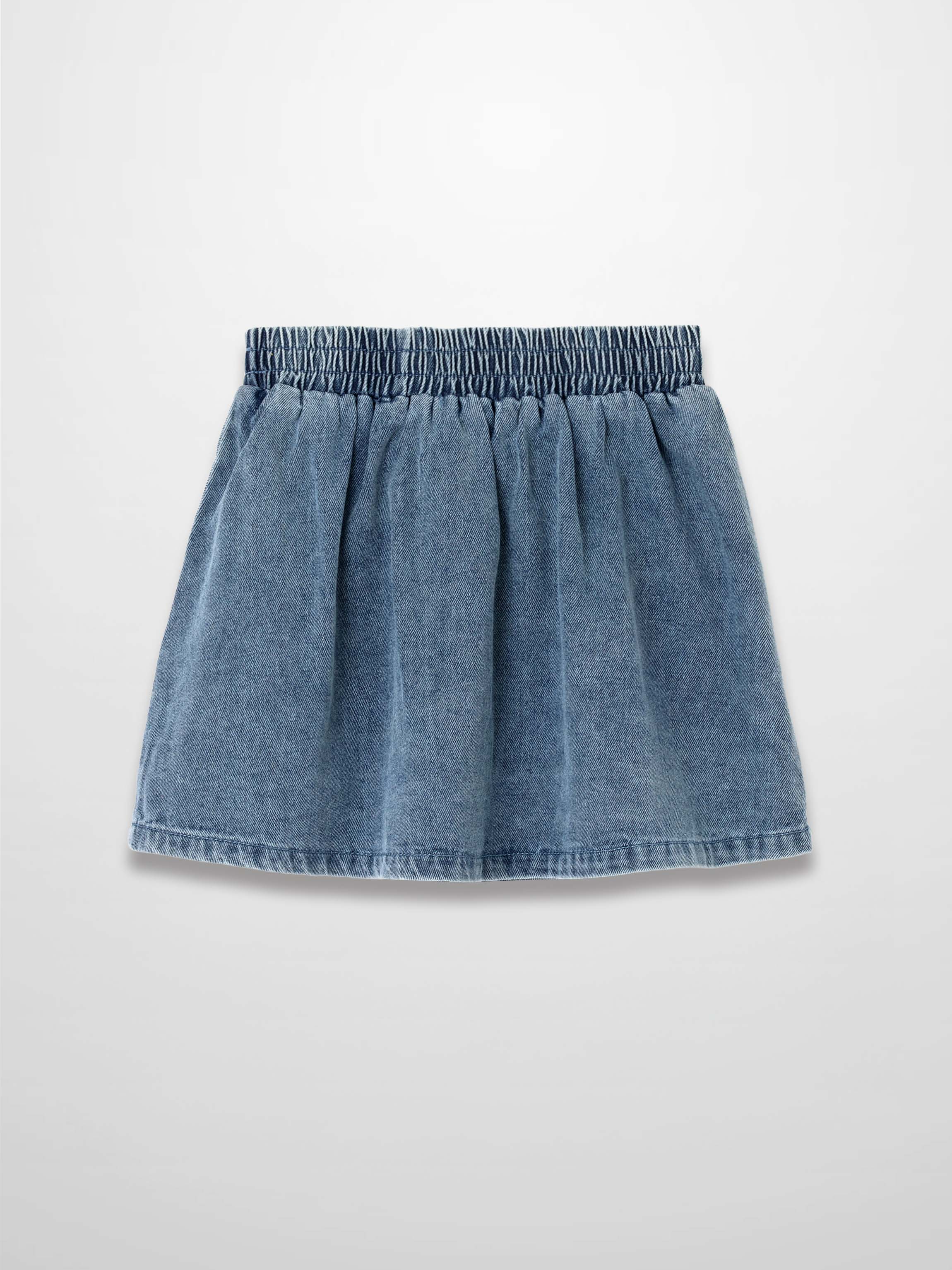 Paneled blue denim skirt with an elastic waistband.