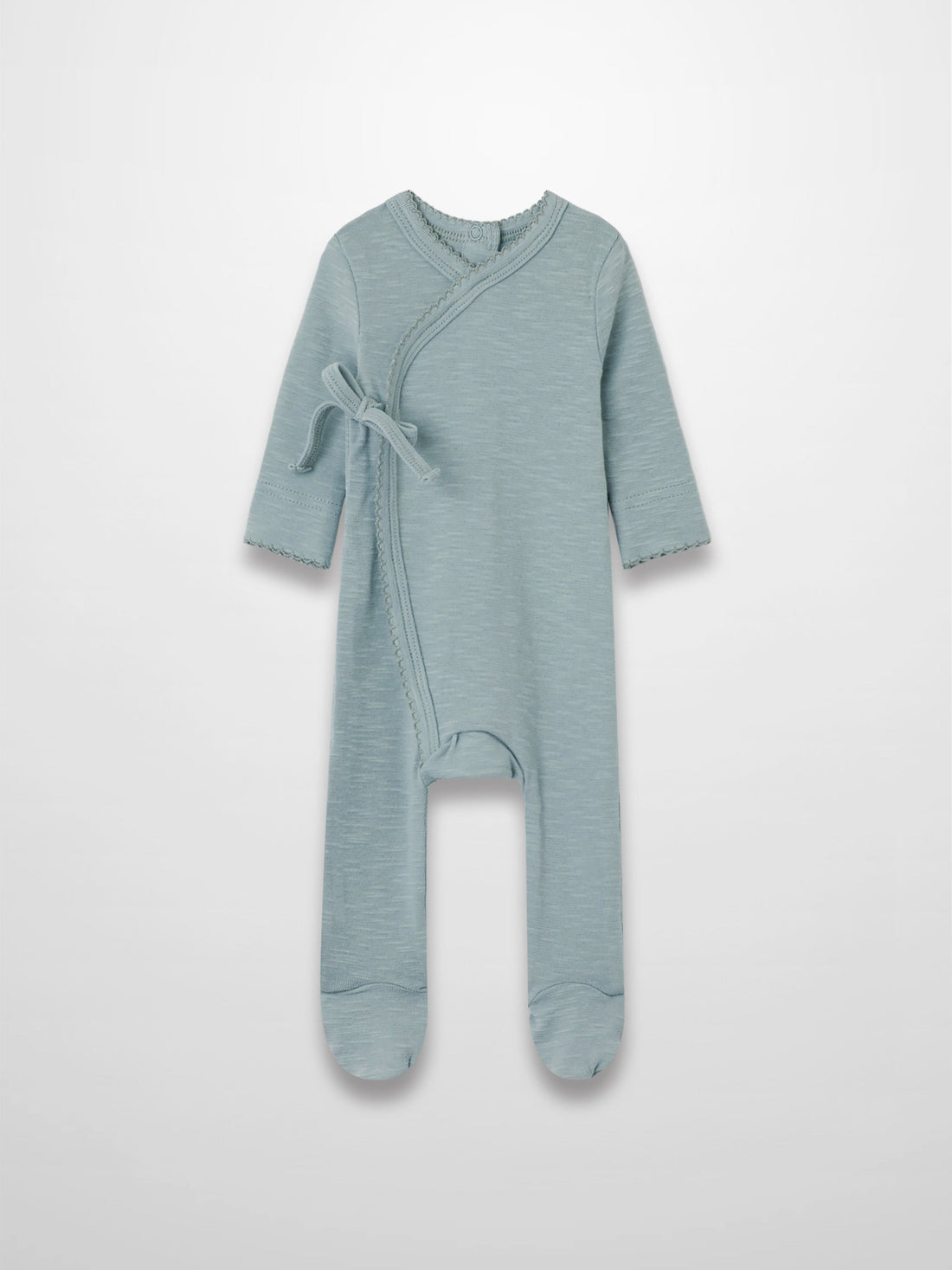 Blue scalloped stretchy baby jumpsuit footie with crossover wrap, scalloped trim, and side tie.