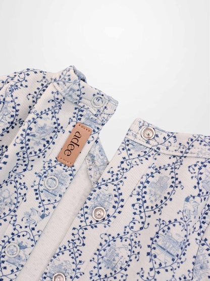 Blue Charm Stretchy boys stretchies by Adee featuring a pattern of dark blue vines.