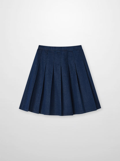 Girls Adee denim pleated skirt in dark blue with structured knife pleats