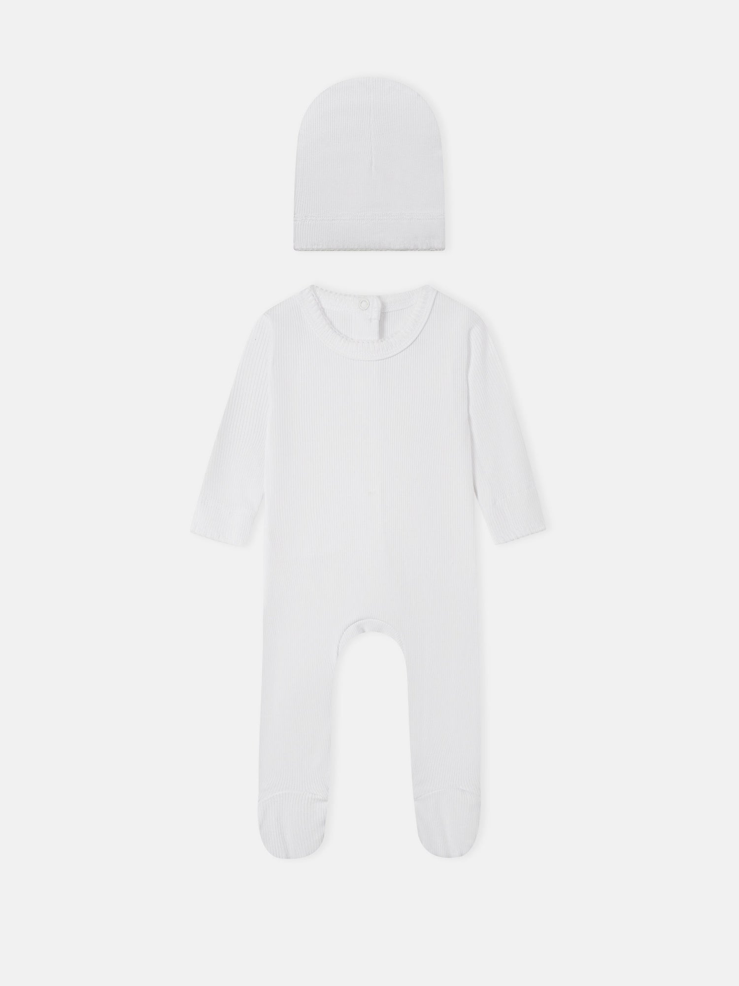 Legacy Stitch White layette set by Adee; 2-piece unisex white ribbed knit hat and footed romper.