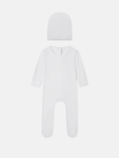 Legacy Stitch White layette set by Adee; 2-piece unisex white ribbed knit hat and footed romper.