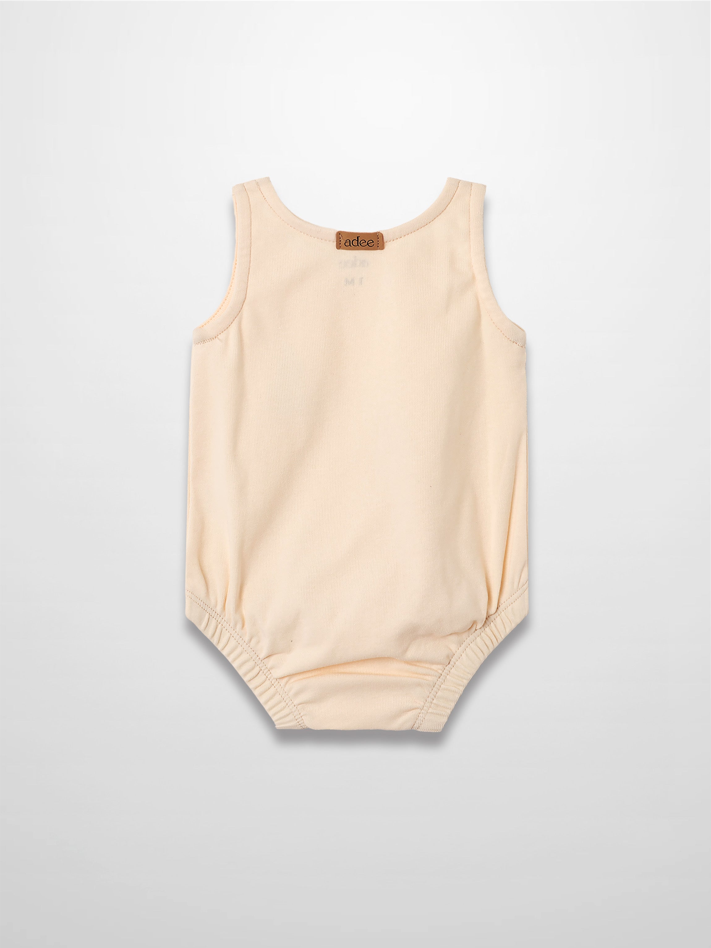 Sail Boat Romper in peach, sleeveless baby romper with elastic leg openings and snaps at bottom.