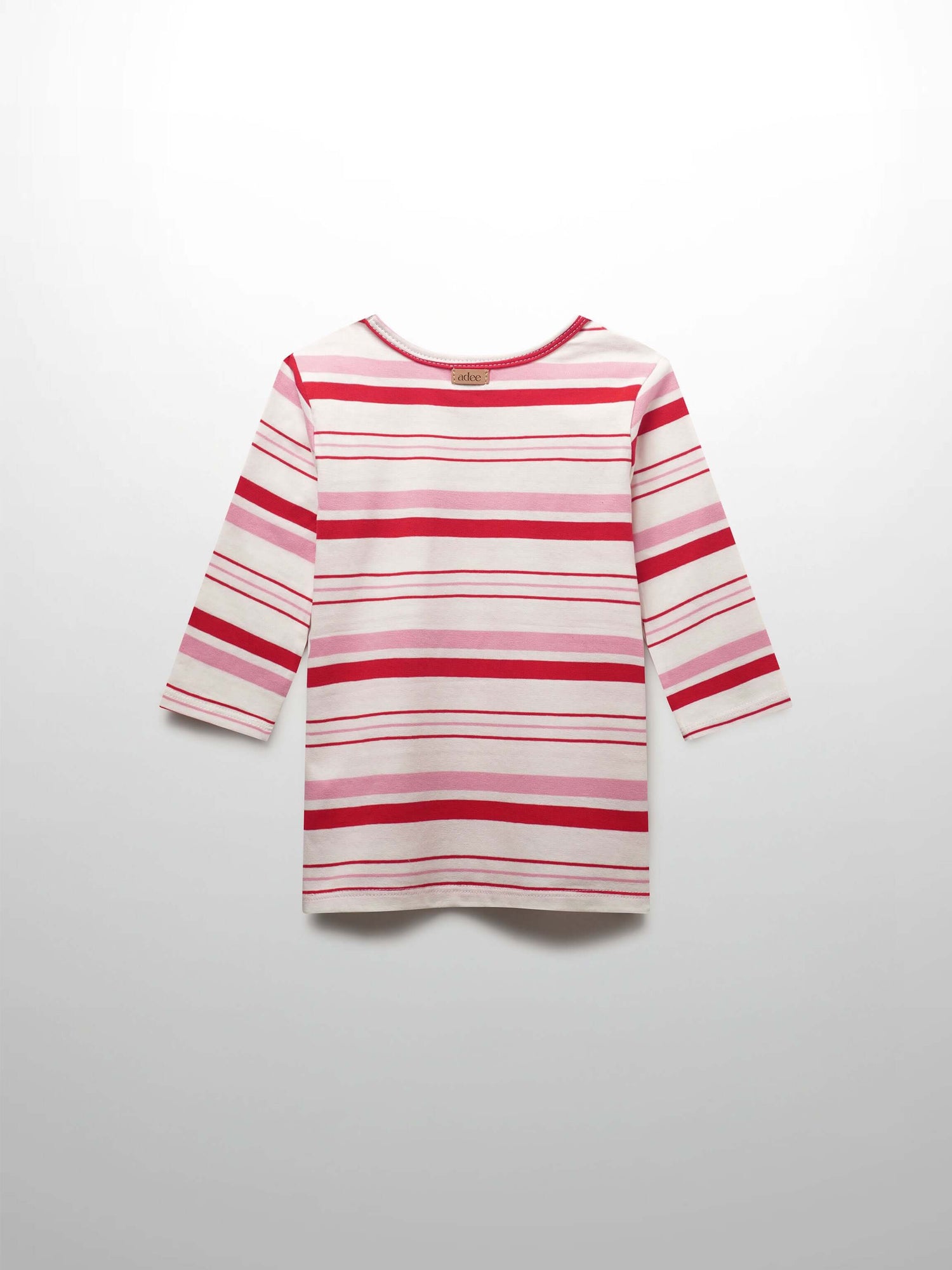 Girls shirts in pink and red stripes