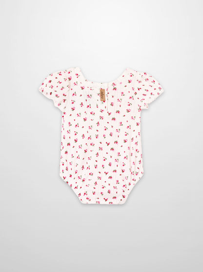 Pointelle Floral Romper for girls by Adee, white with pink floral print