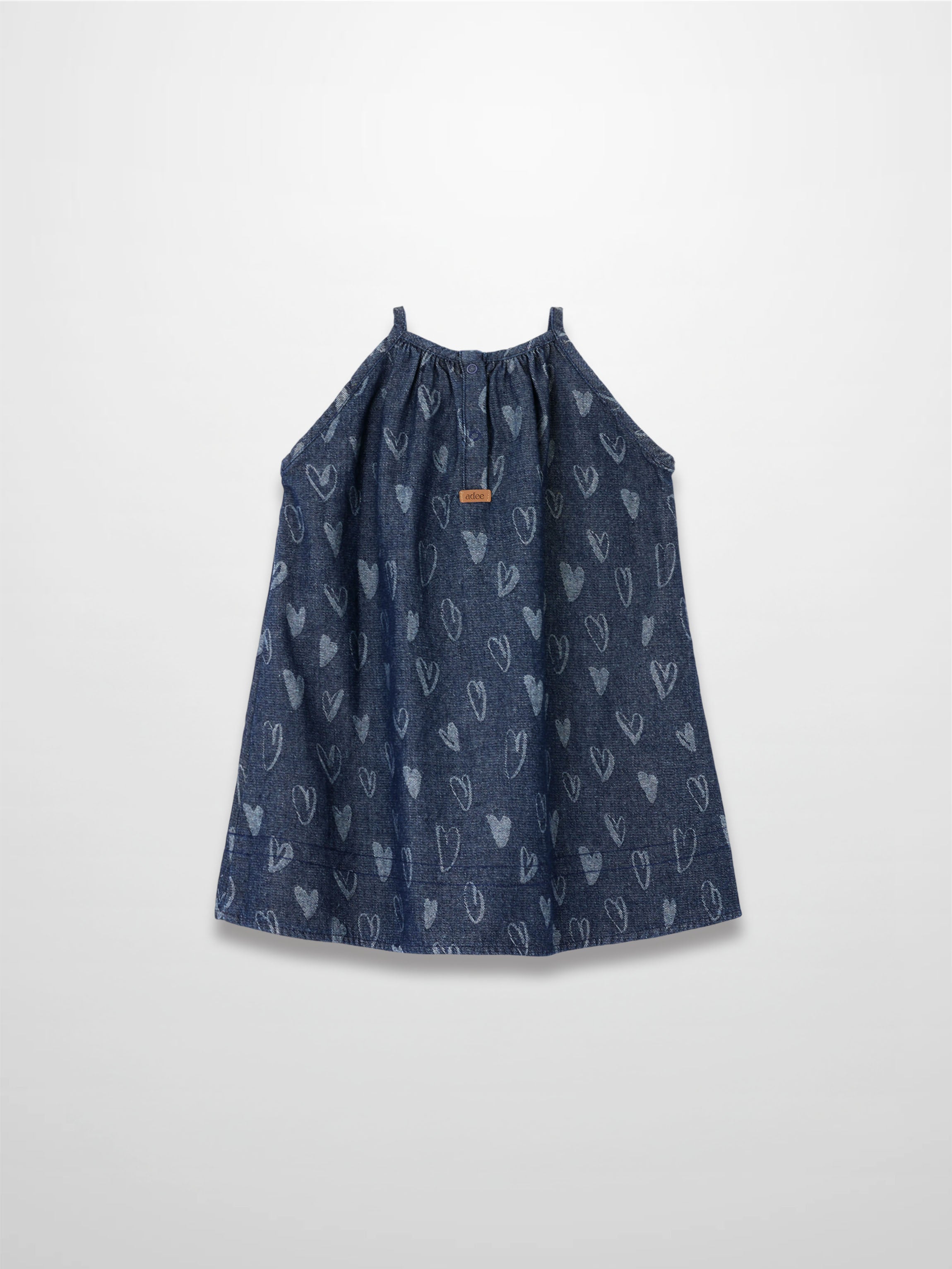 Denim Heart Jumper dress in dark indigo with light-blue heart prints and an elastic neckline.