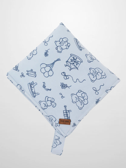 Storybook Lovey with Clip, blue square security blanket with dark blue bears, carousels, balloons, and rocking horses.