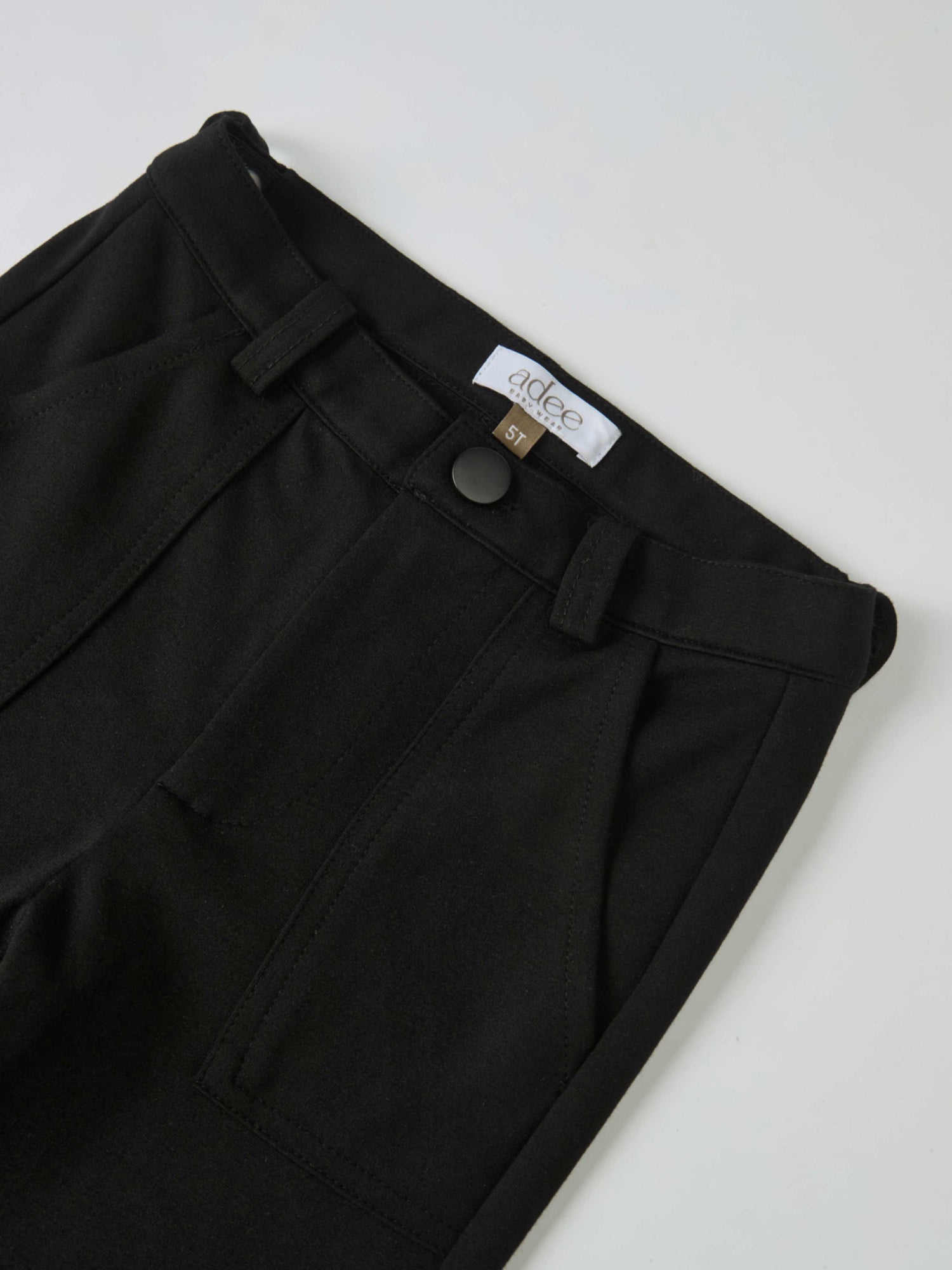 Adee boys dress pants in black with belt loops, front pockets, and a metal button; size 5T.