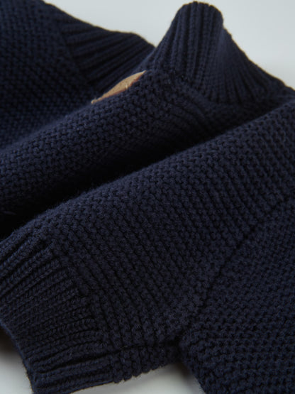 Cropped Cardigan navy knit with ribbed cuffs; unisex dressy top.