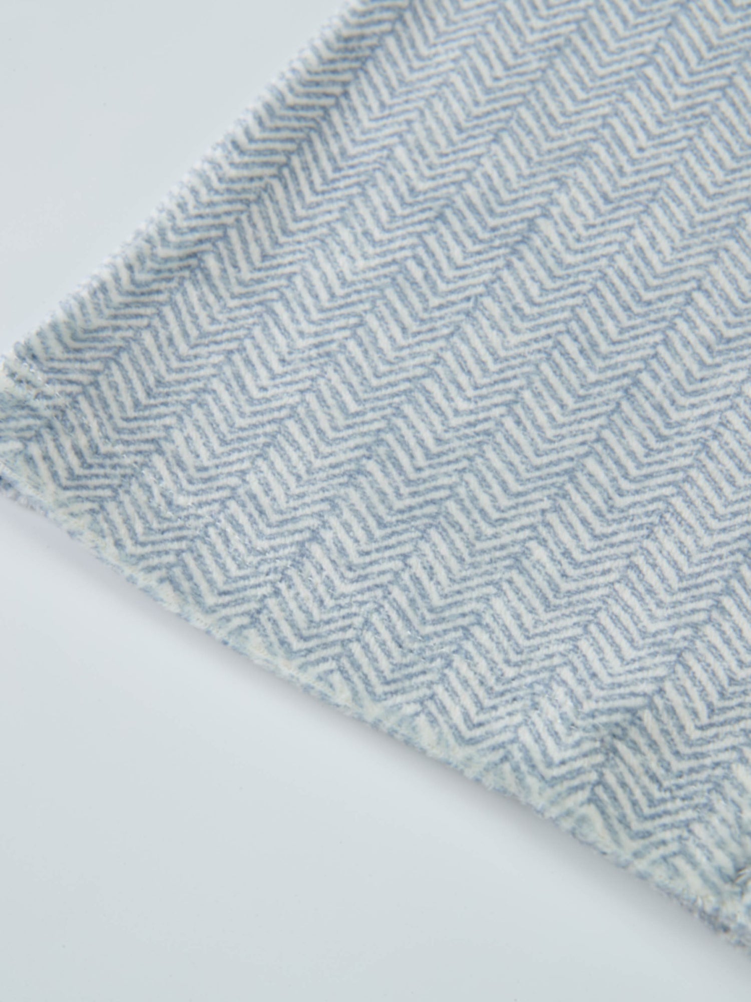 Adee boys pajamas in blue herringbone pattern fabric close-up