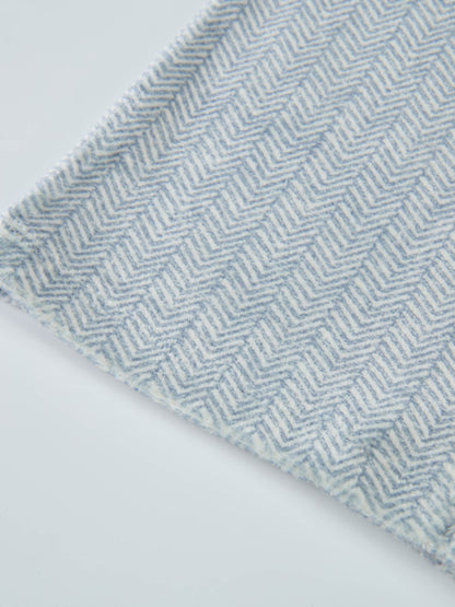 Adee boys pajamas in blue herringbone pattern fabric close-up