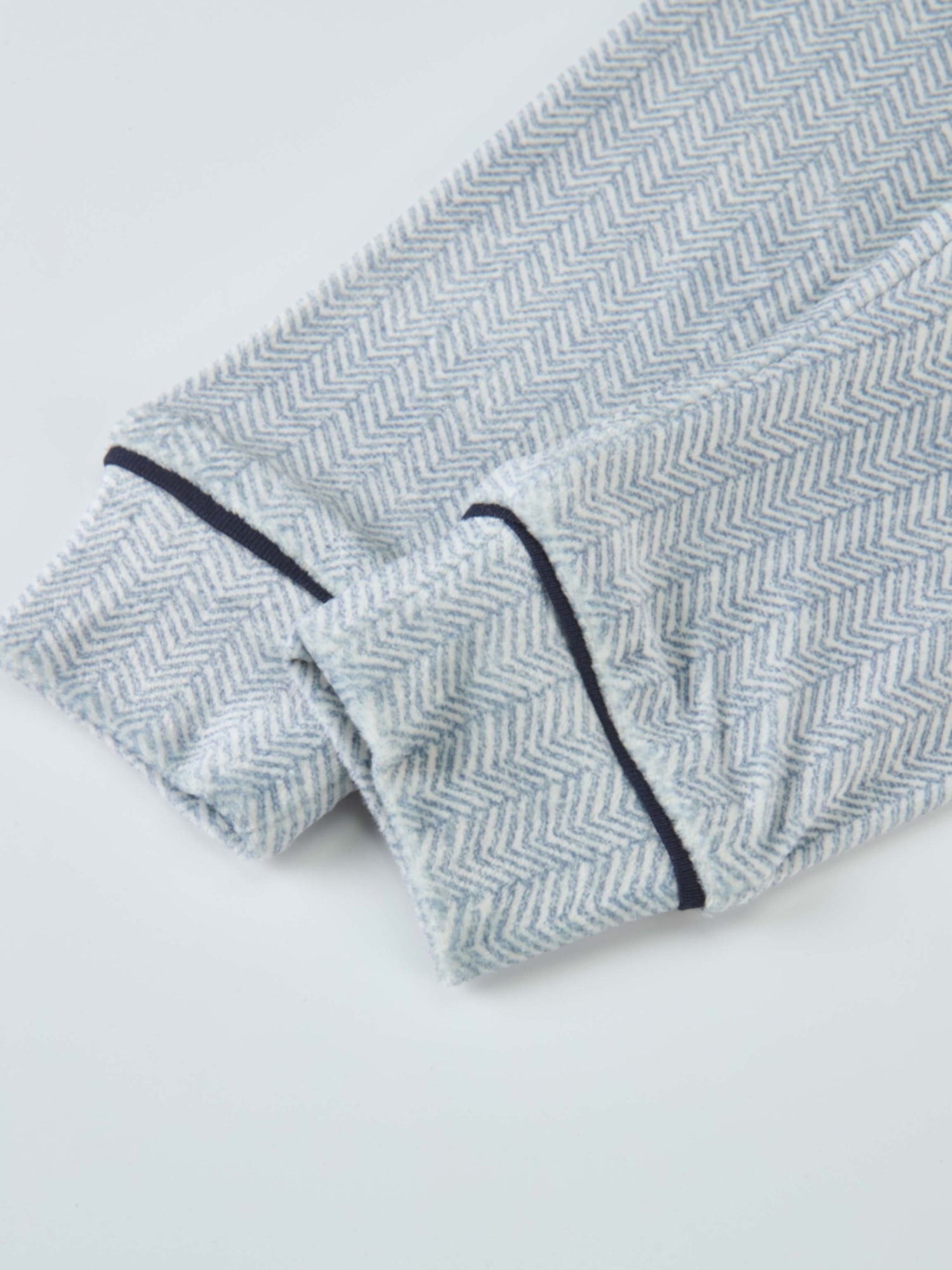 Herringbone blue boys pajamas with navy piping trim