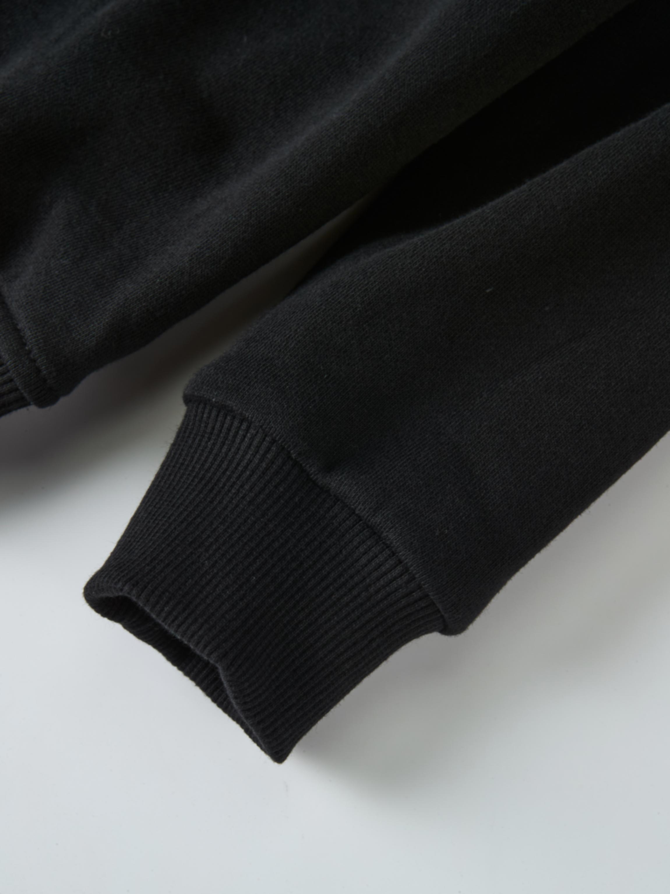 Collared black sweatshirt with ribbed cuffs, unisex top
