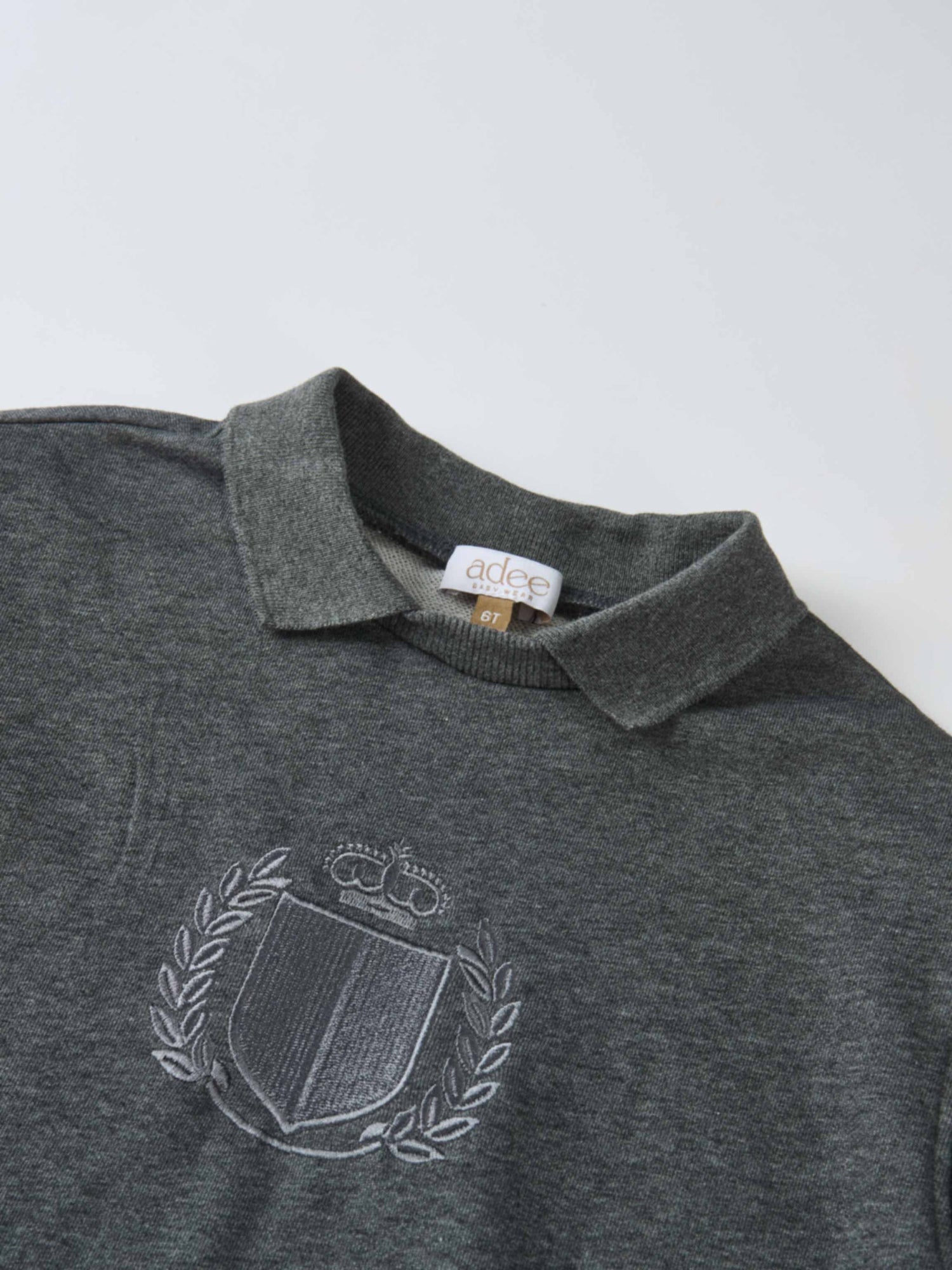 Windsor Dress; grey knit fabric, polo collar, embroidered laurel crest, Adee brand