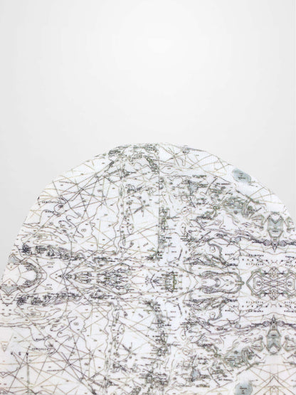 Map Beanie for baby boys in off-white with a fine map print, grey lines, compass marks, and decorative stitching.