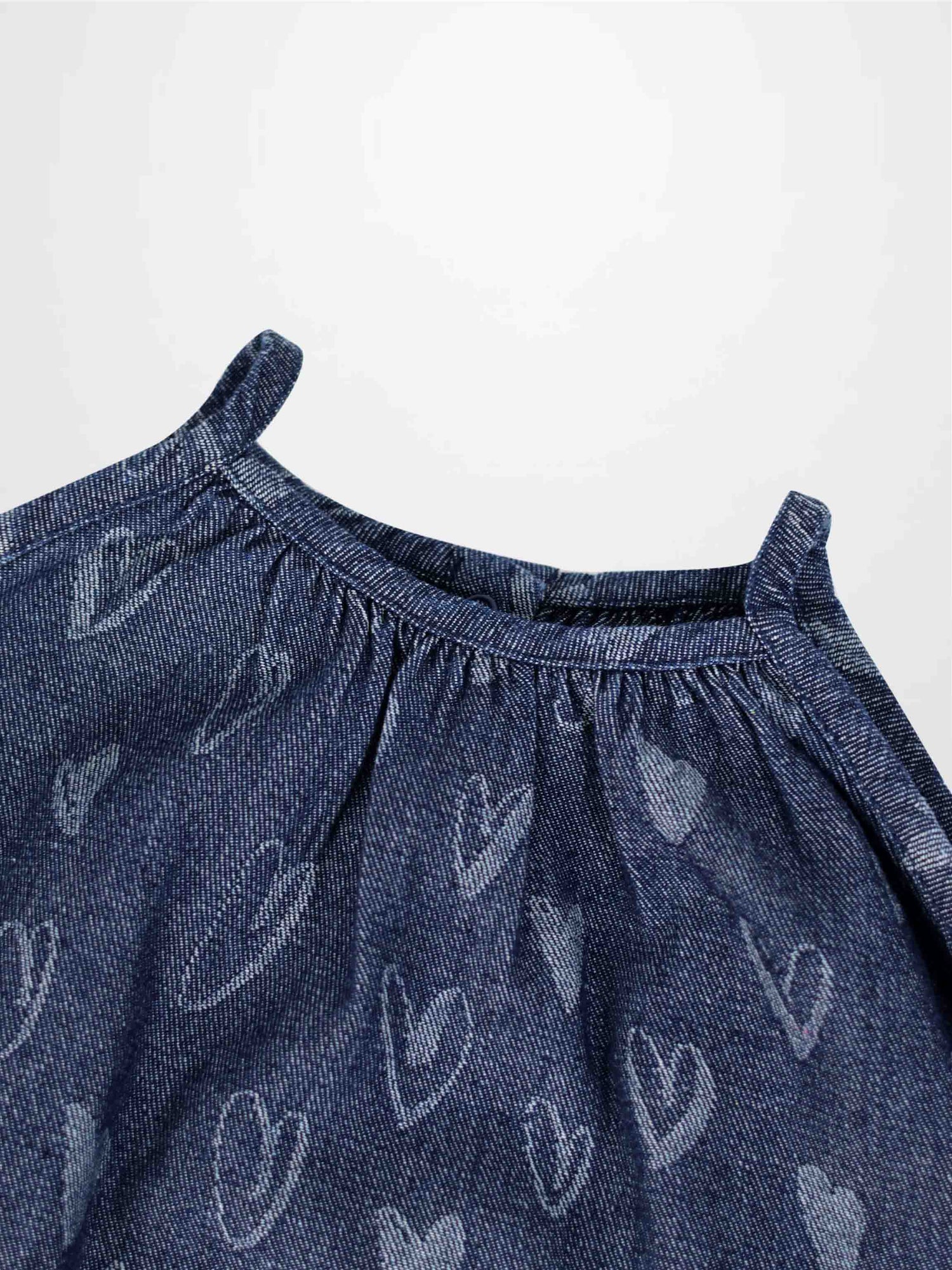 Denim heart jumper with a gathered neckline and heart-pattern print.