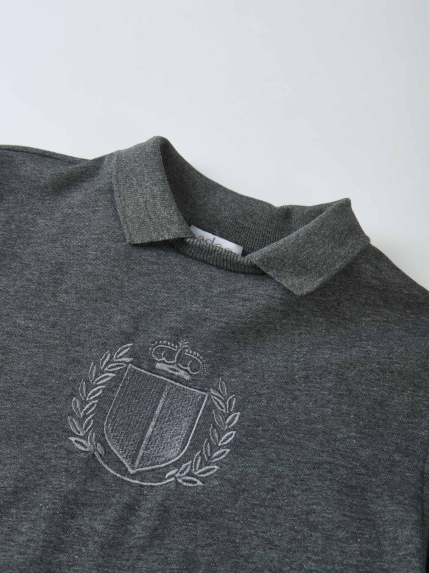 Windsor Sweatshirt by Adee; heather charcoal gray unisex top with crest embroidery
