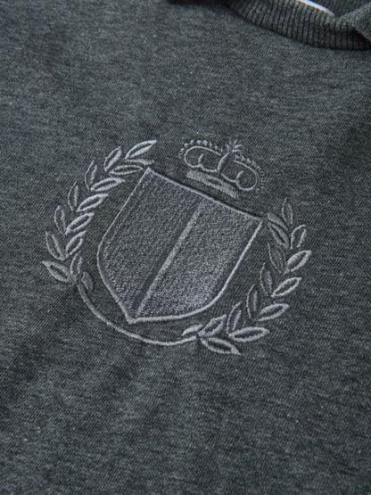 Windsor Sweatshirt by Adee; charcoal gray knit with white embroidered crest and laurel on chest, unisex top.