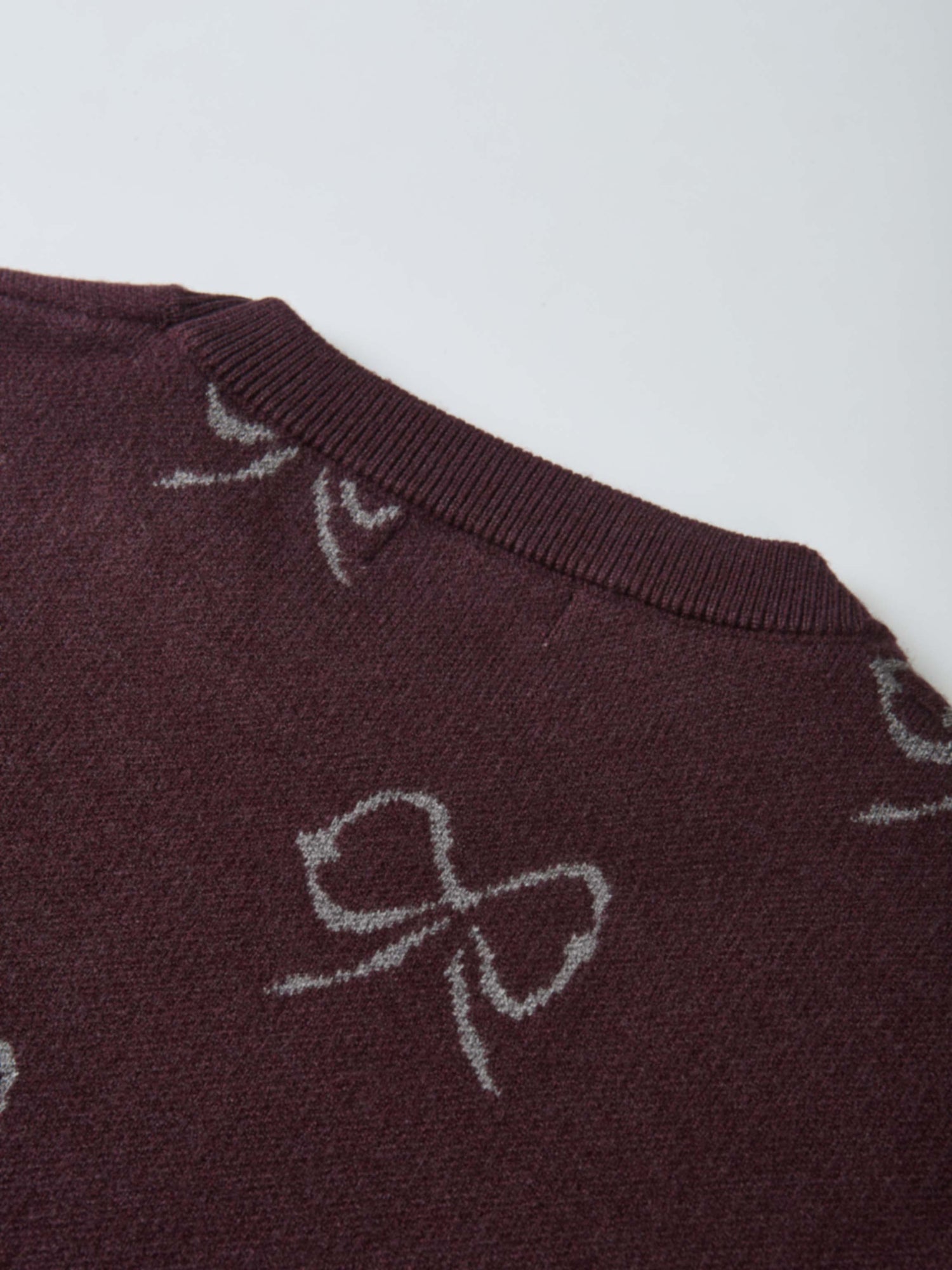 Bow Knit Sweater Burgundy for girls by Adee; dressy knit top with gray bow motifs.