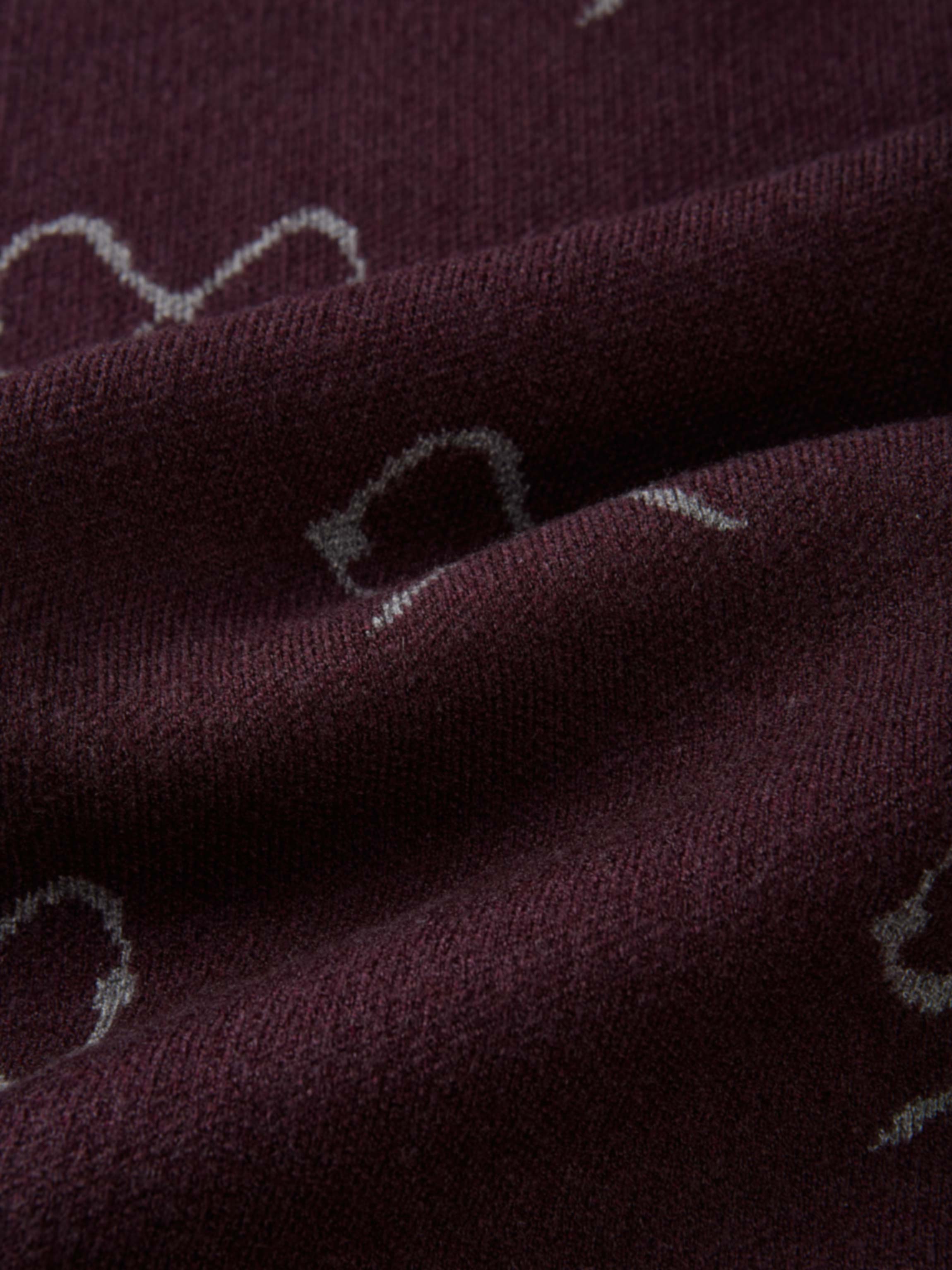 Bow Knit Sweater by Adee, burgundy knit fabric with white bow pattern