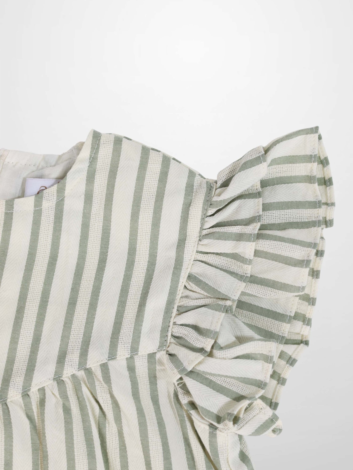 Light green and cream striped dress with ruffled sleeve detail