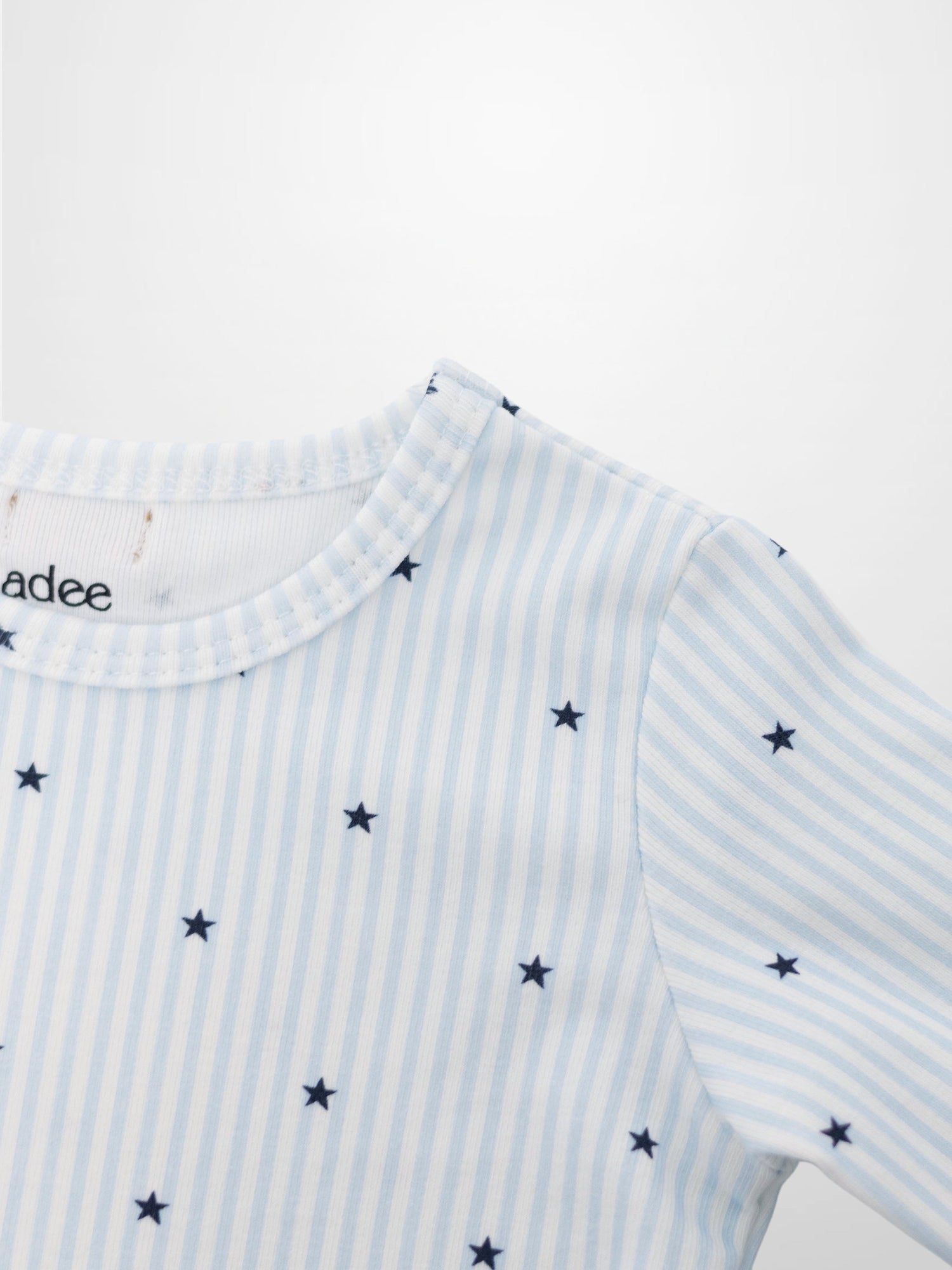 Blue Star Pajamas for boys by Adee; striped light blue and white top with navy stars.