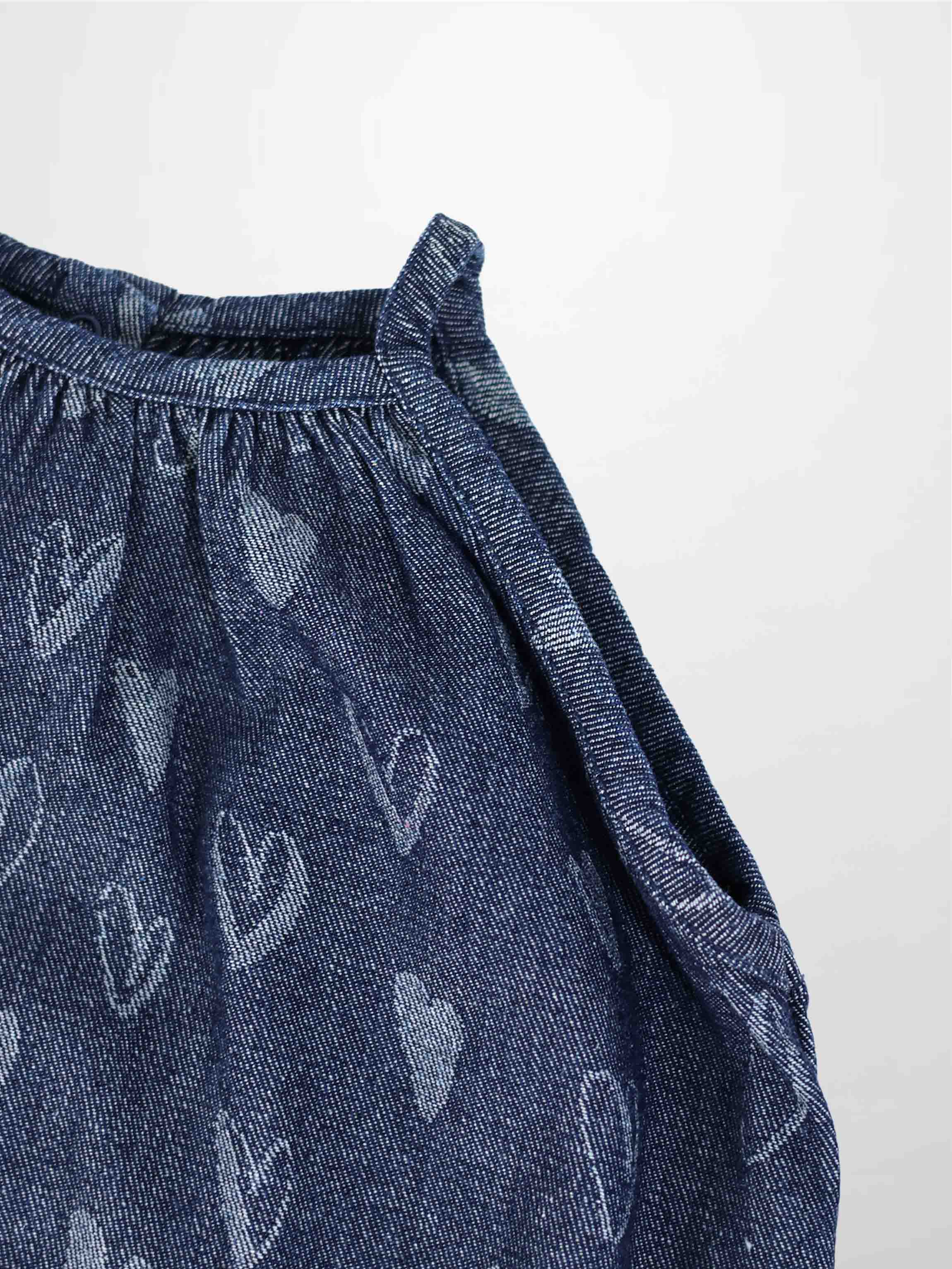 Denim Heart Jumper fabric close-up with white heart prints and gathered neckline
