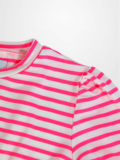 Neon pink and white striped dress with a rounded neckline and gathered 3/4 sleeves, close-up shoulder detail.