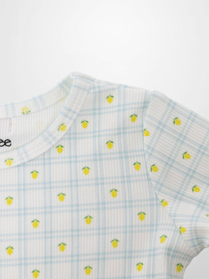 Lemon Window Pajamas: white base with light blue grid plaid and tiny yellow lemons.